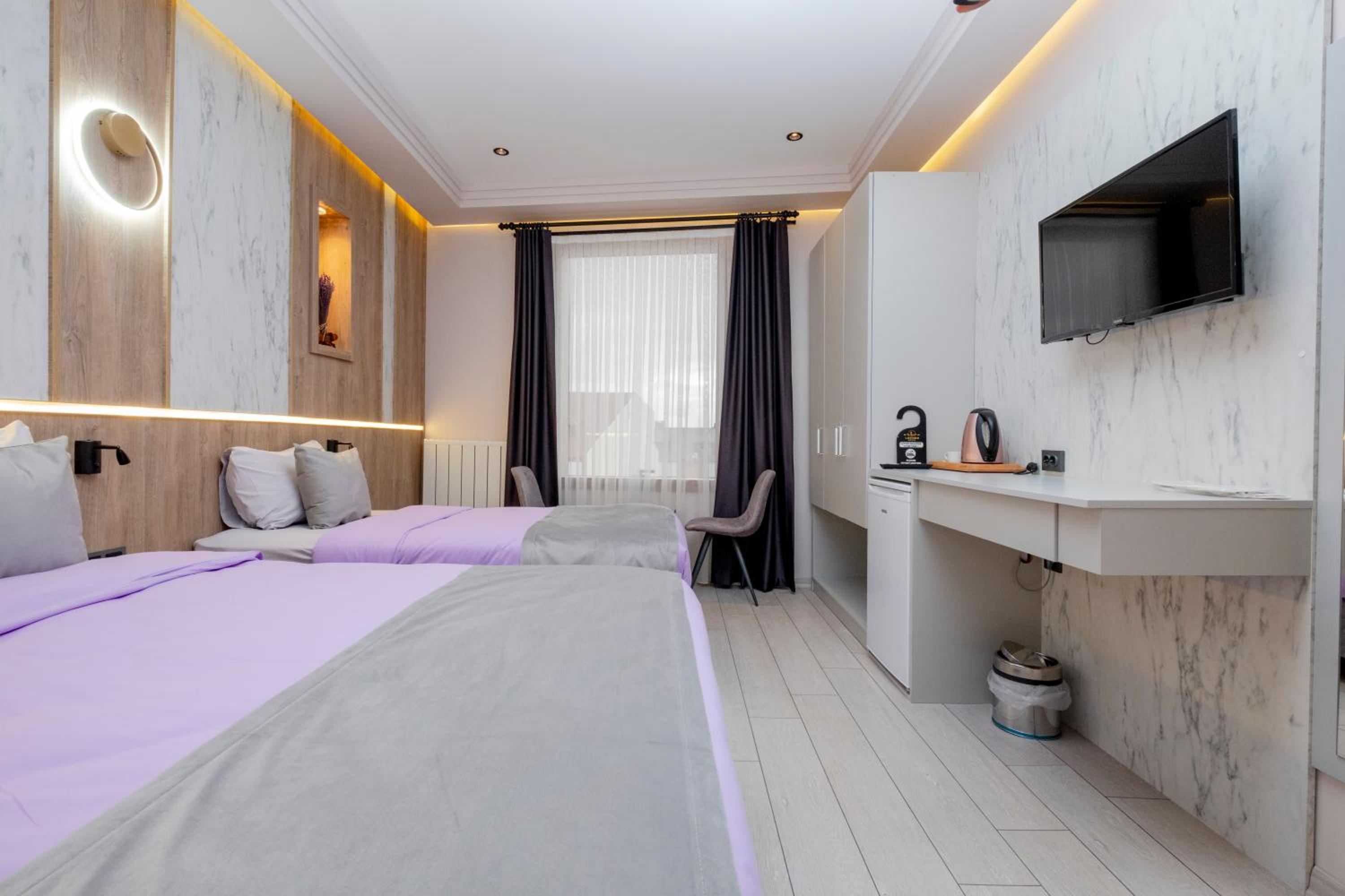 Luxury Triple Room - Photo 17