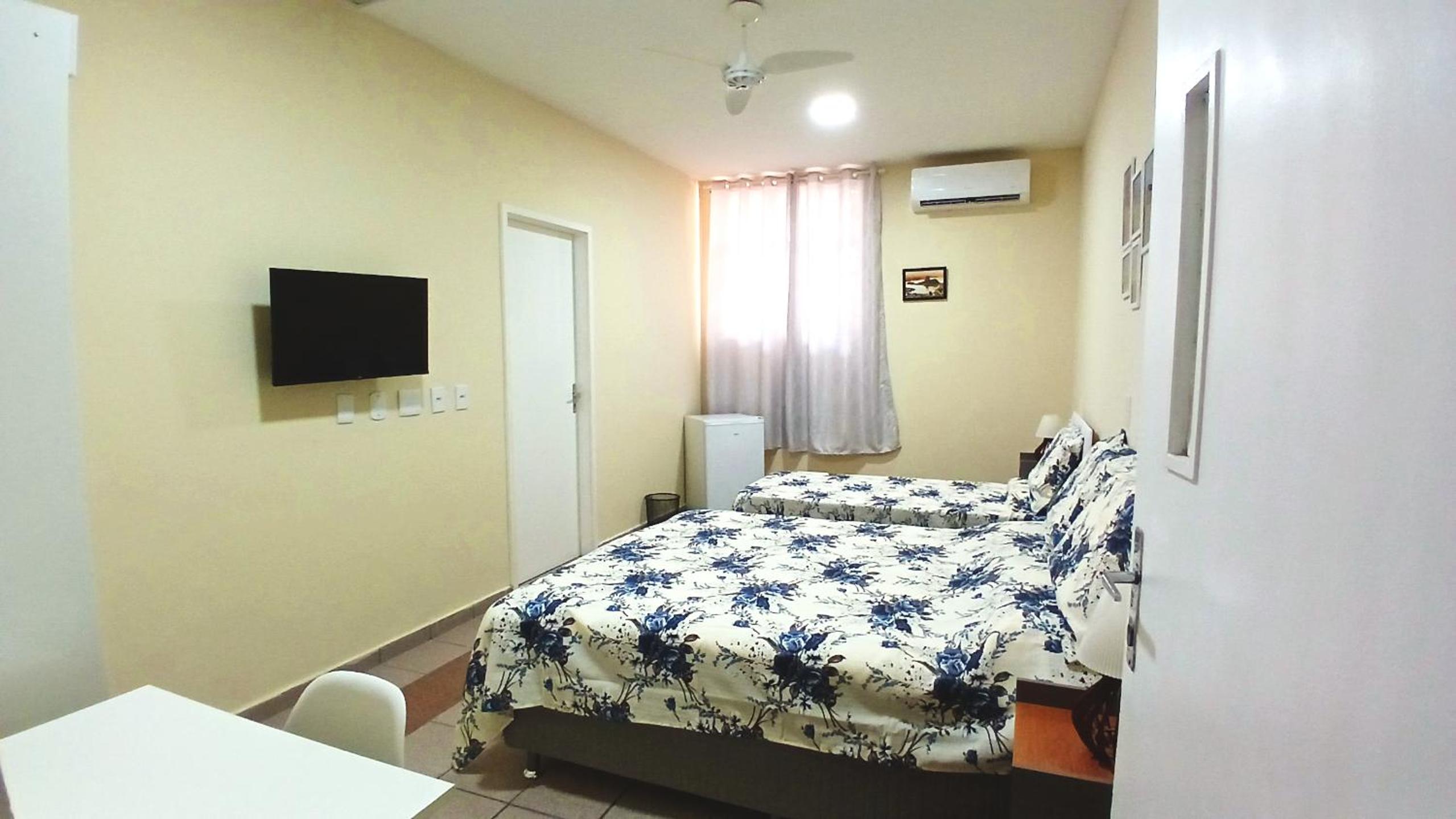 Economy Triple Room With Shared Bathroom