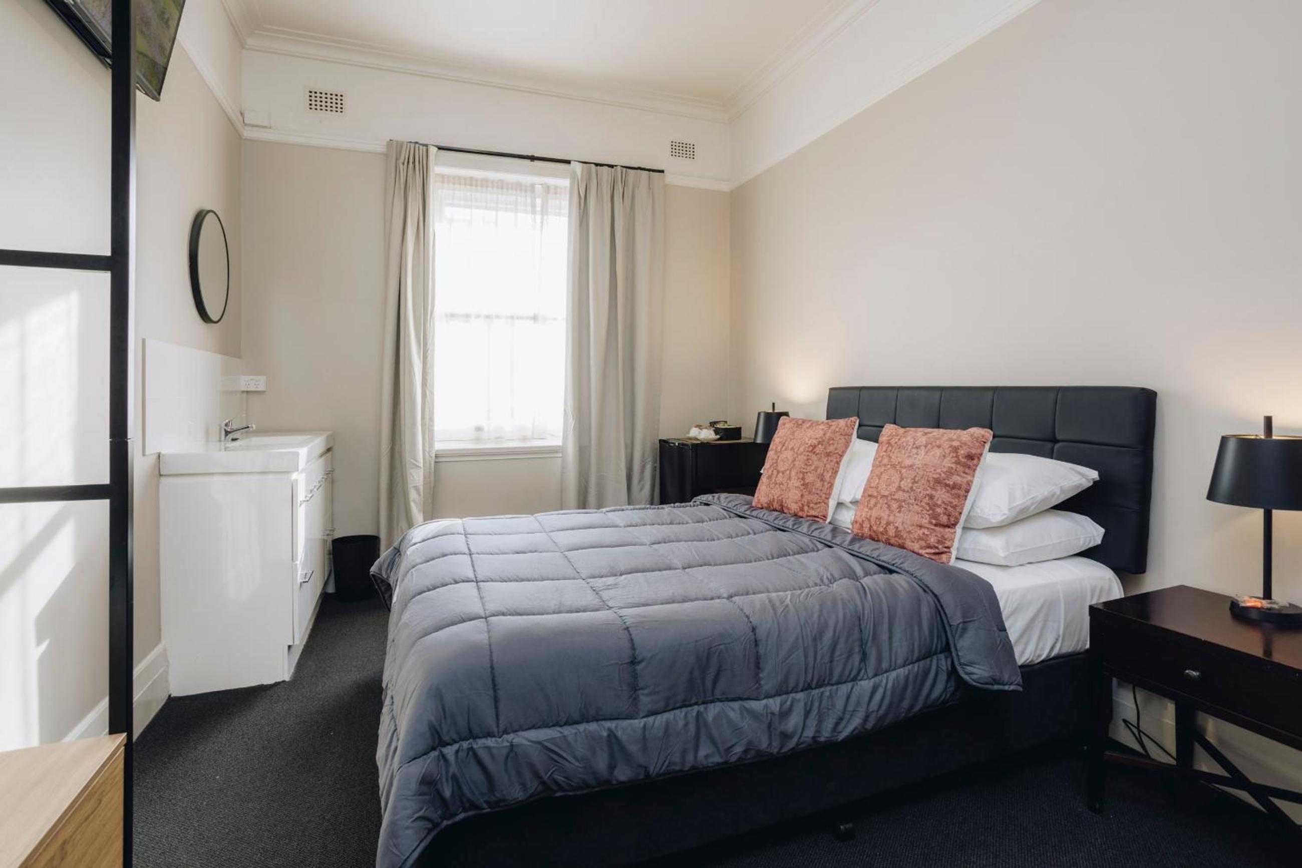 Queen Room with Shared Bathroom
