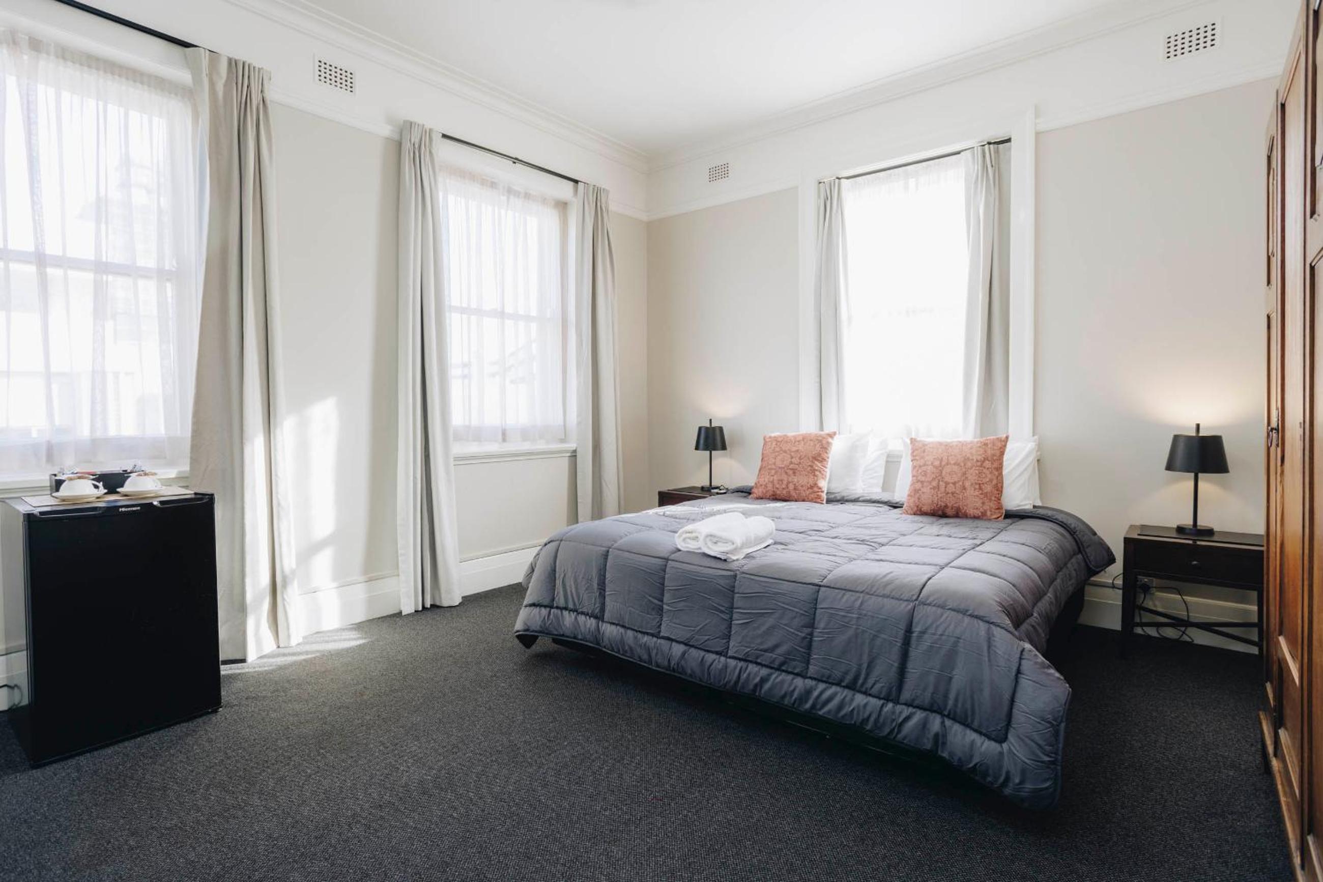 Deluxe King Room with Shared Bathroom