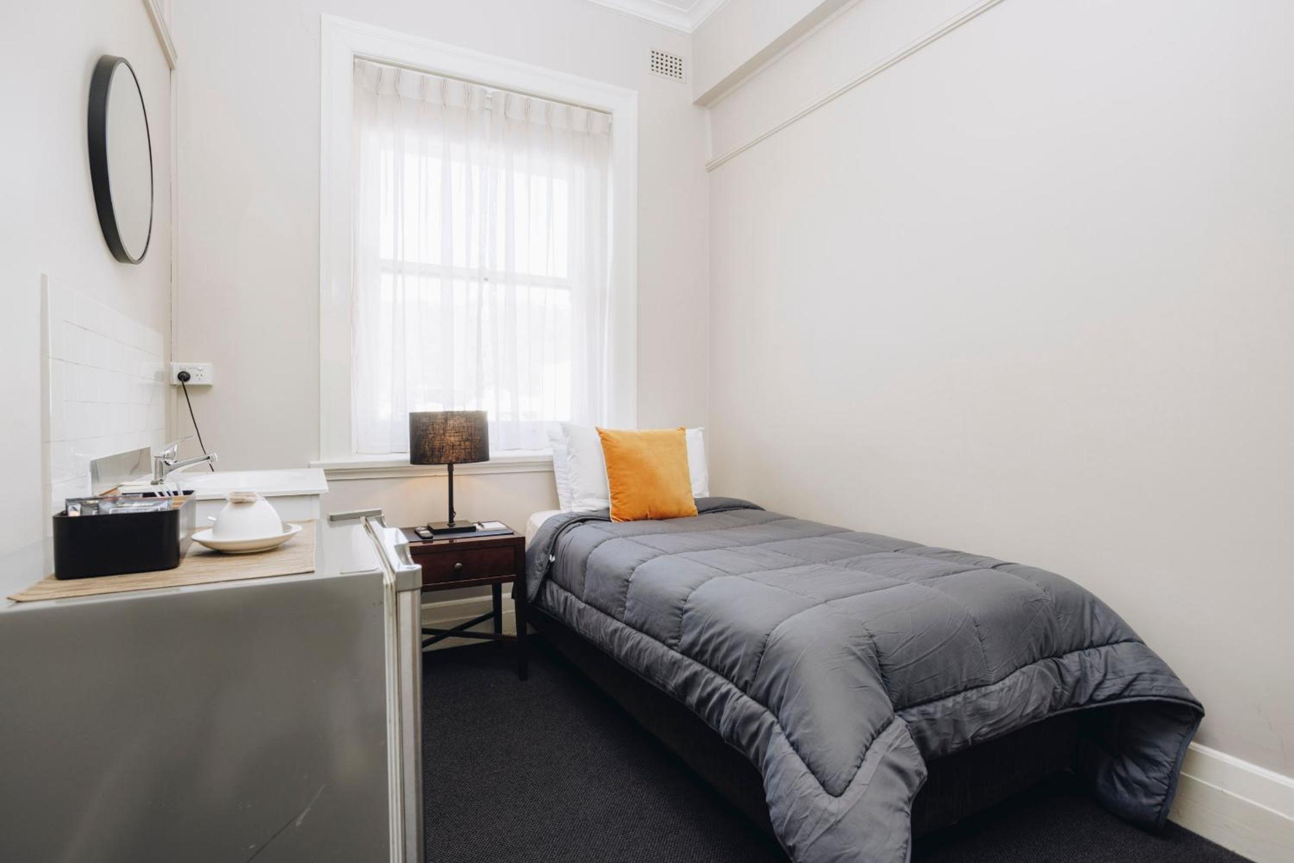 Small Single Room with Shared Bathroom