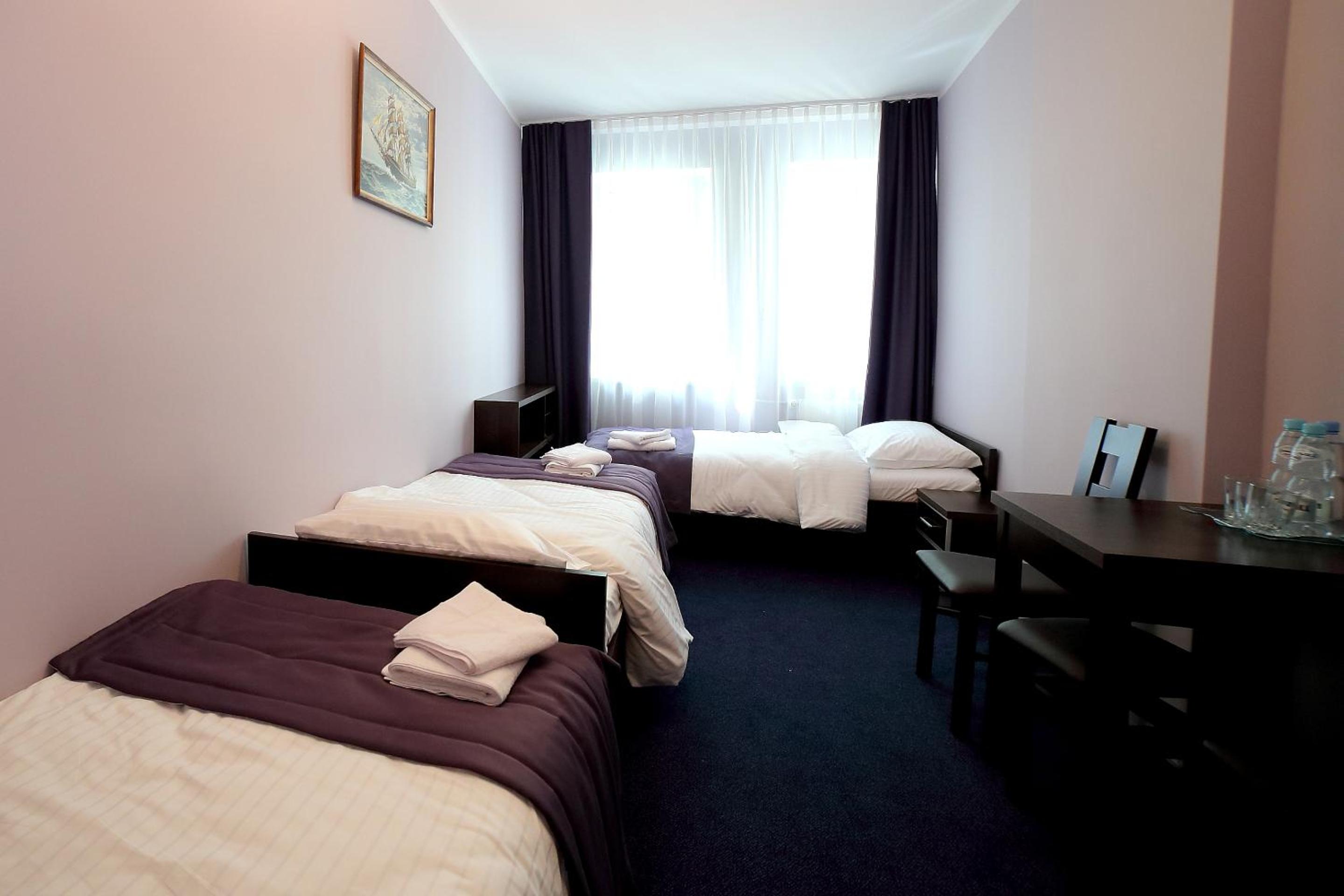 Basic Triple Room with Shared Bathroom photo 1