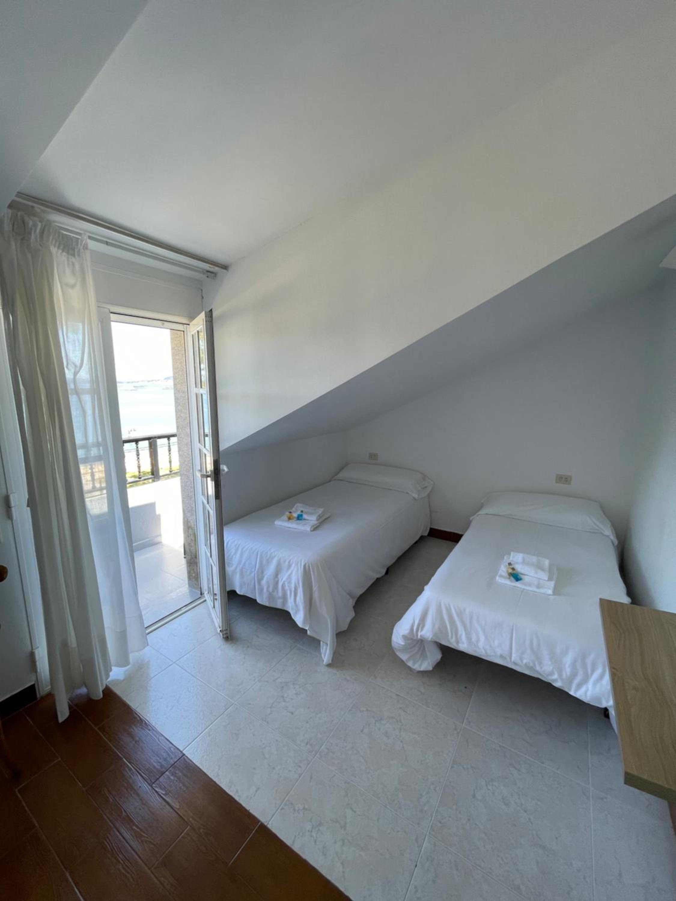 Habitación Cuádruple con Vista al Mar