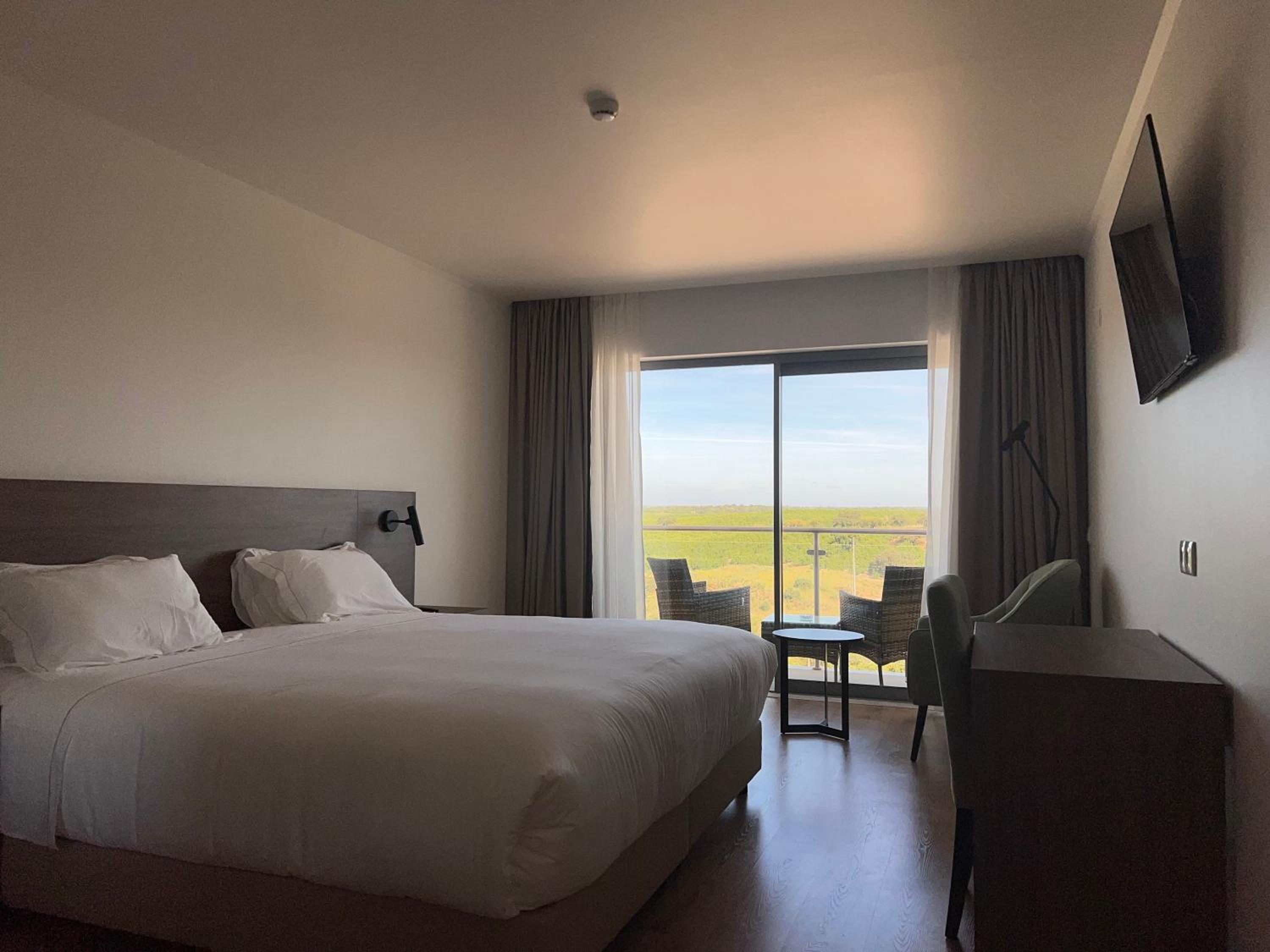 King Room with Balcony - Photo 1