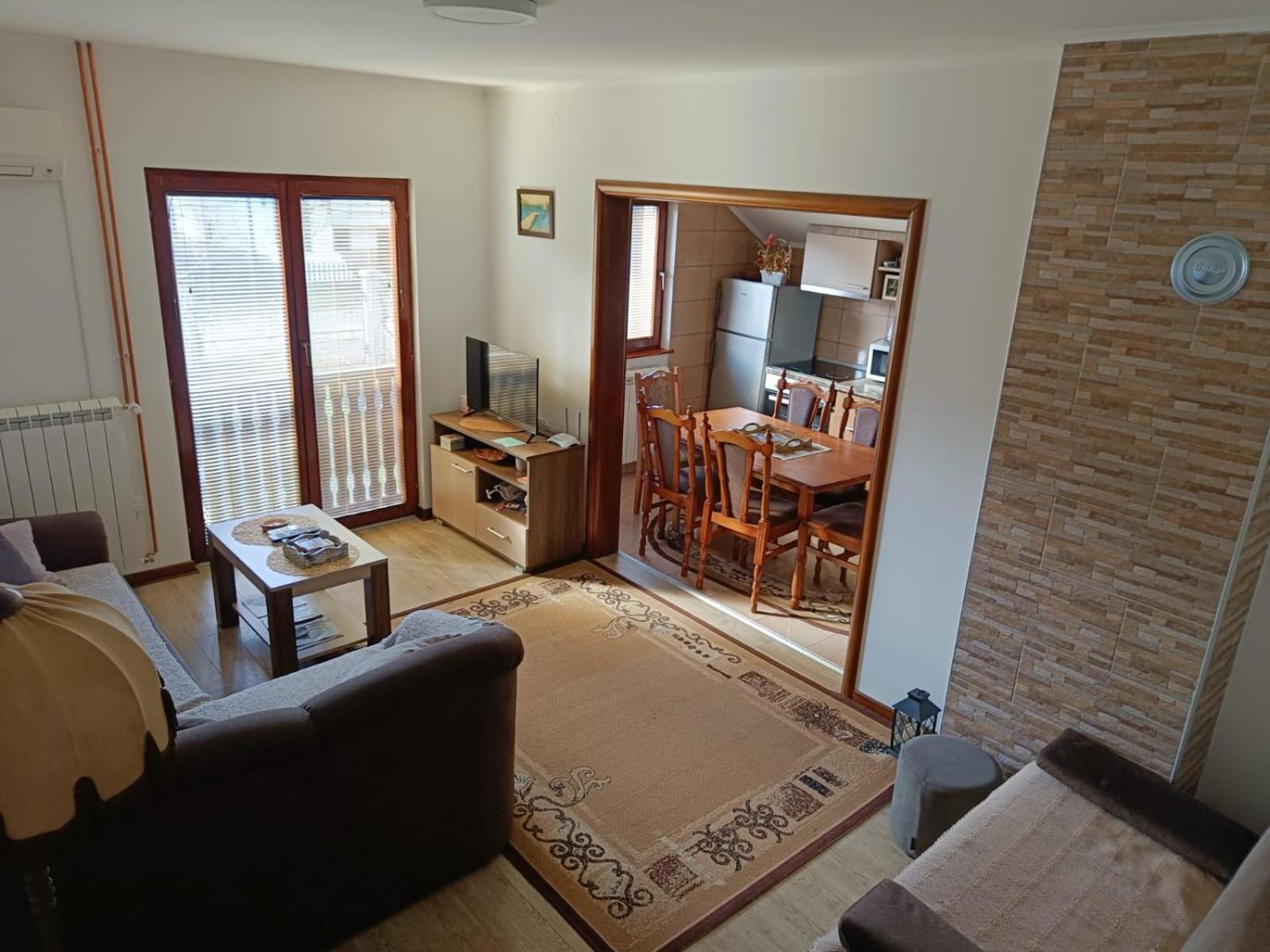 Three-Bedroom Apartment photo 1