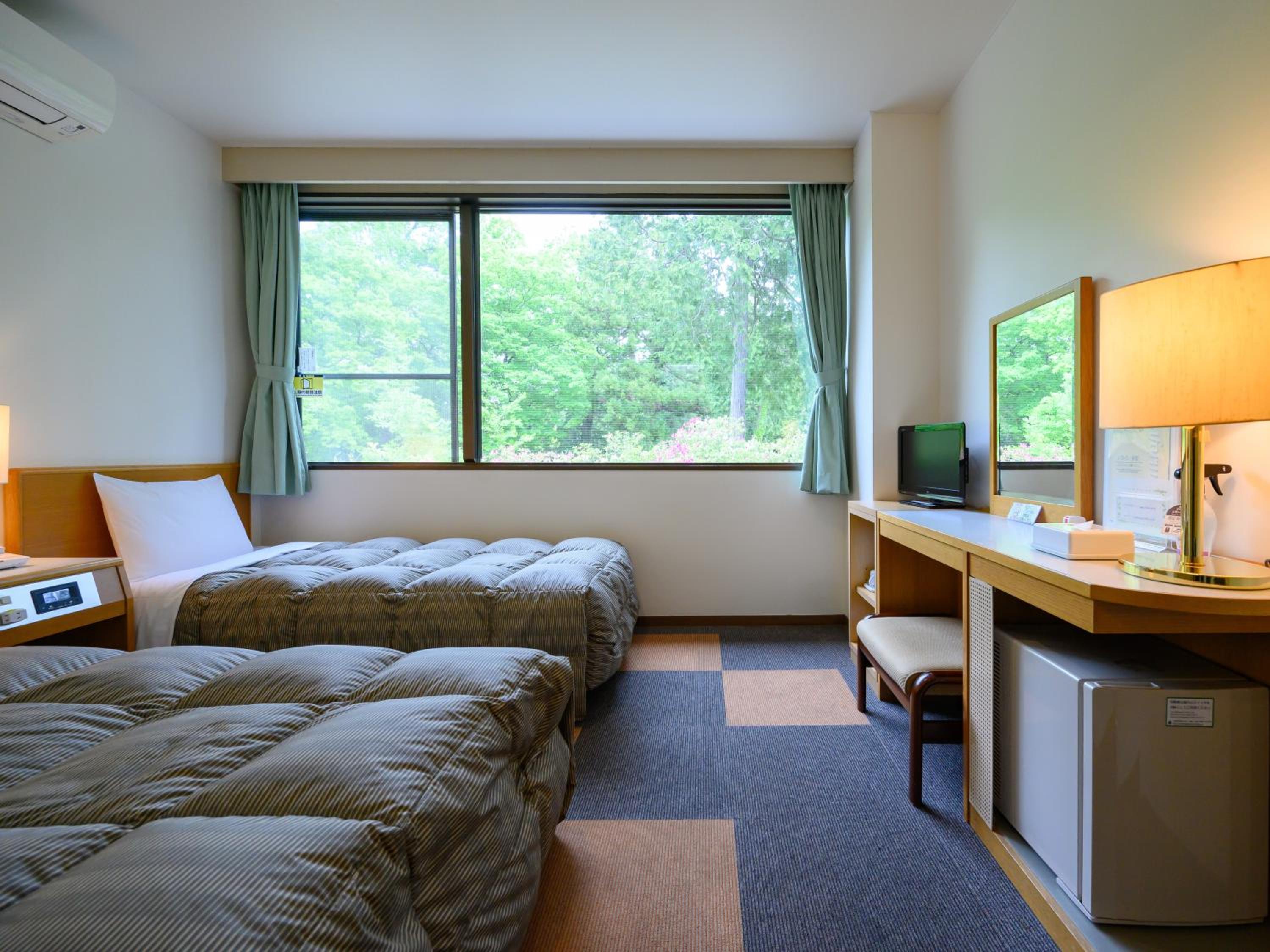 Twin Room with Private Bathroom - Photo 1