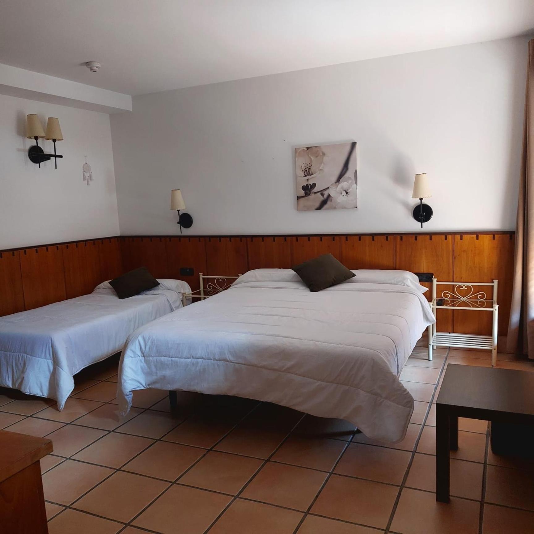 Habitación Triple con Balcón