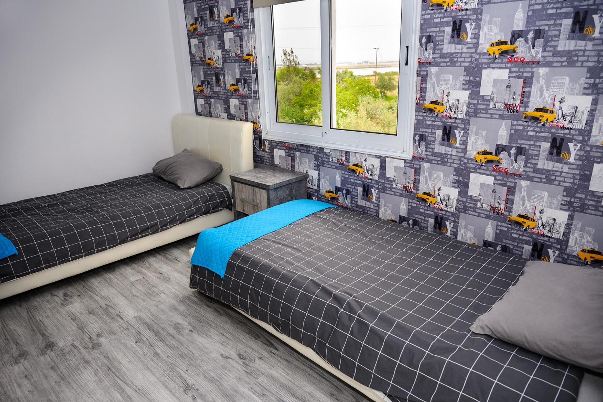 Three-Bedroom Apartment - Photo 20
