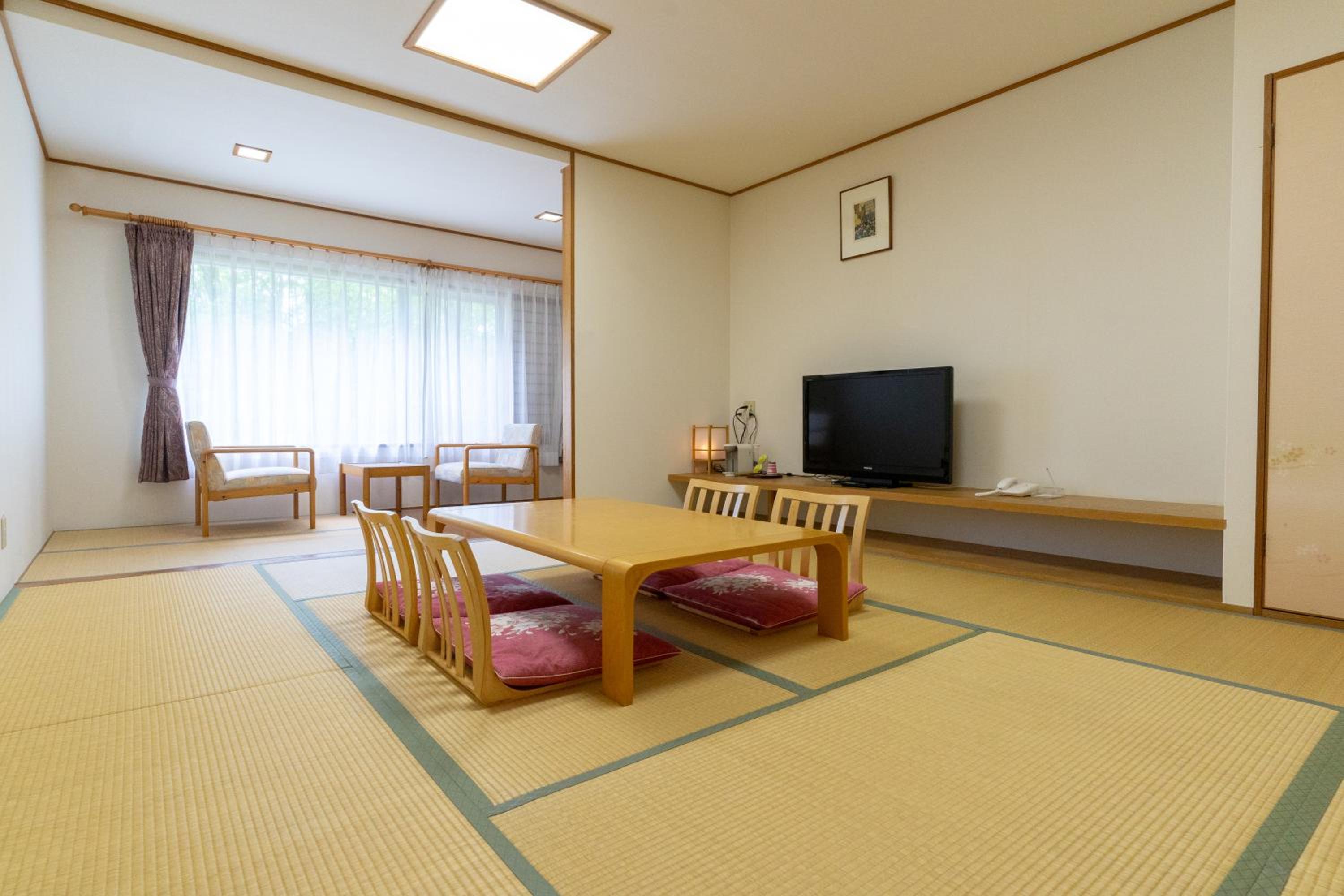 Quadruple Room - Photo 1