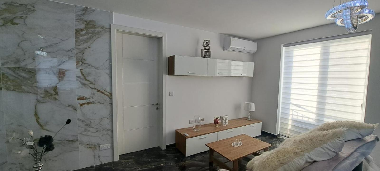 Three-Bedroom Apartment photo 2