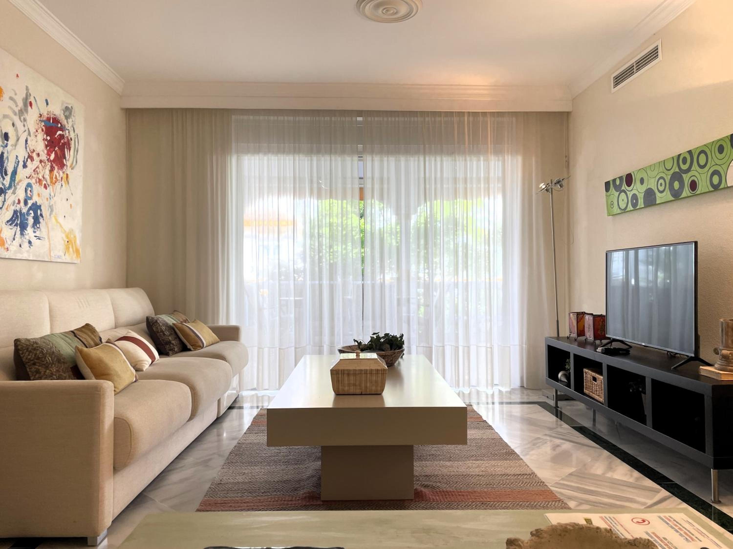 Apartamento con vista al jardín