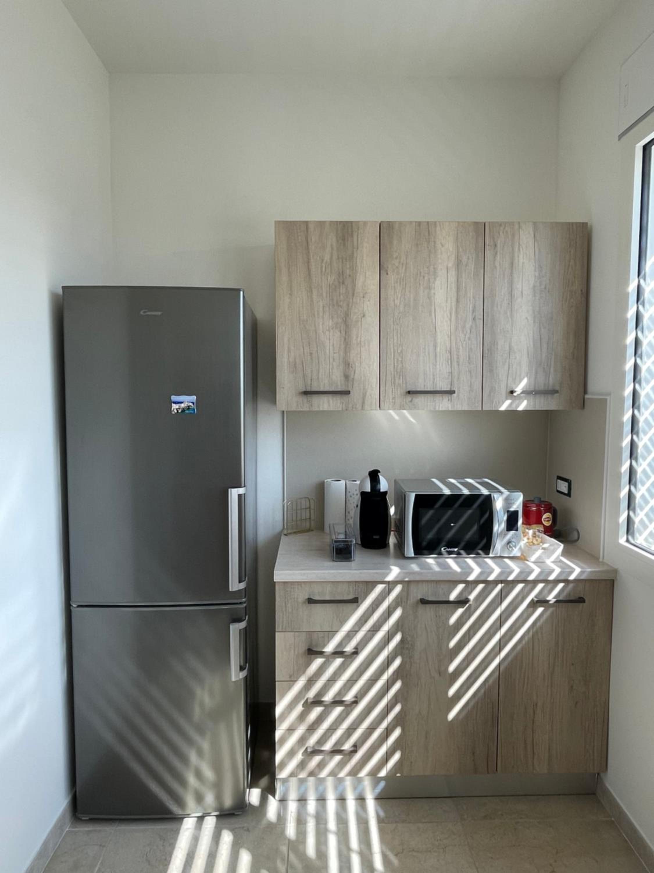 Three-Bedroom Apartment photo 2