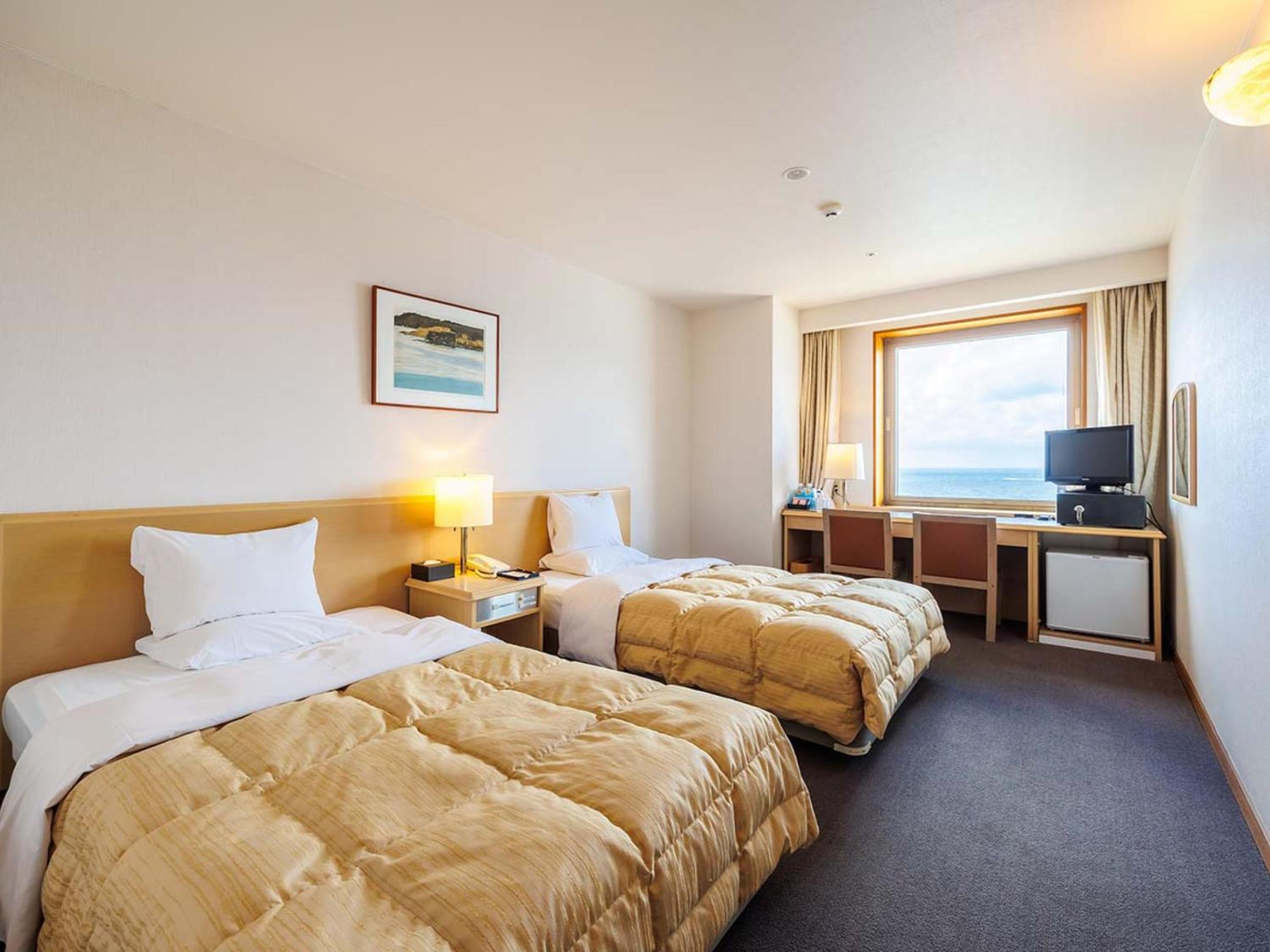 Twin Room with Sea View - Non-Smoking photo 1