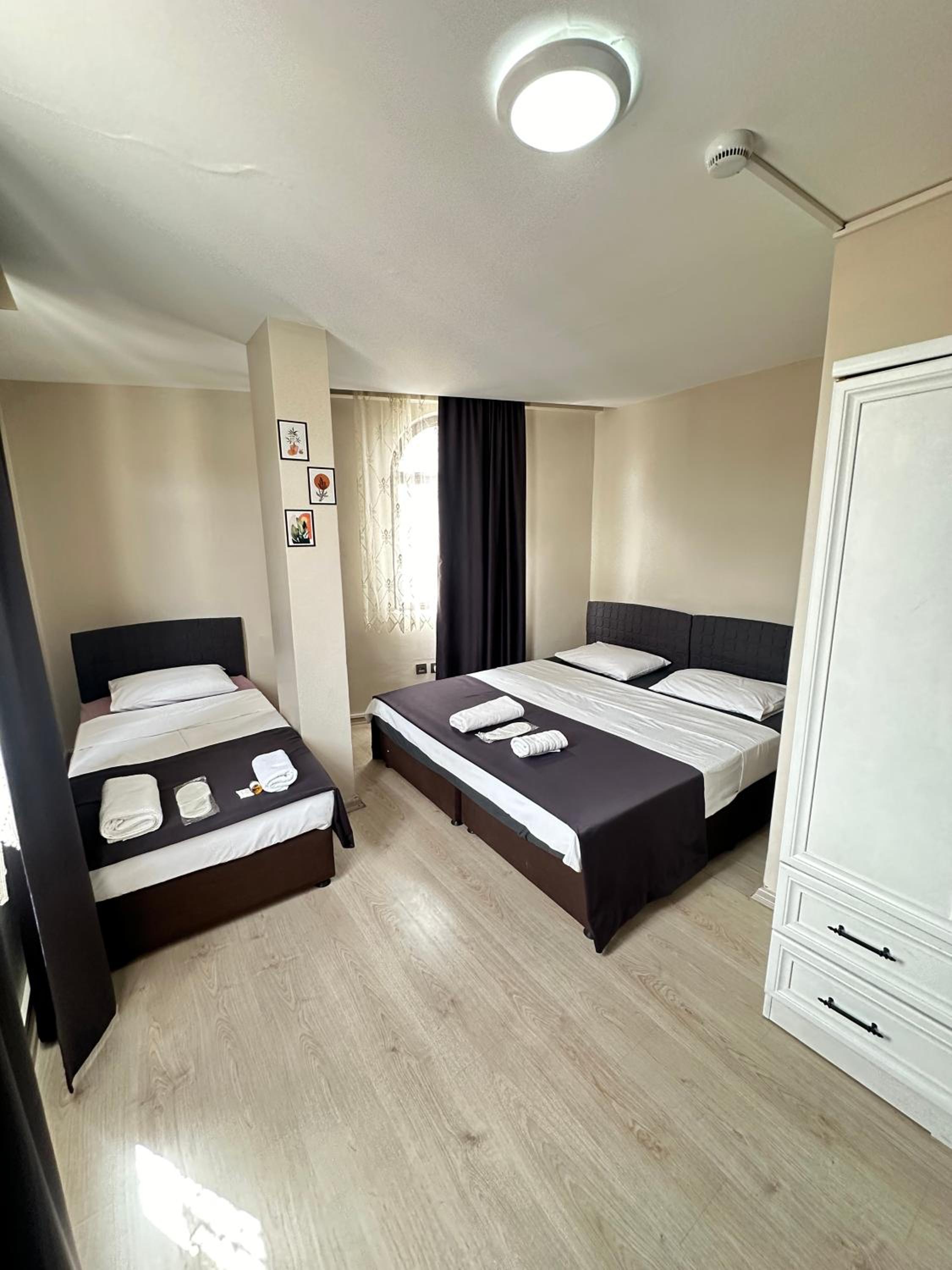 Triple Room - Photo 1