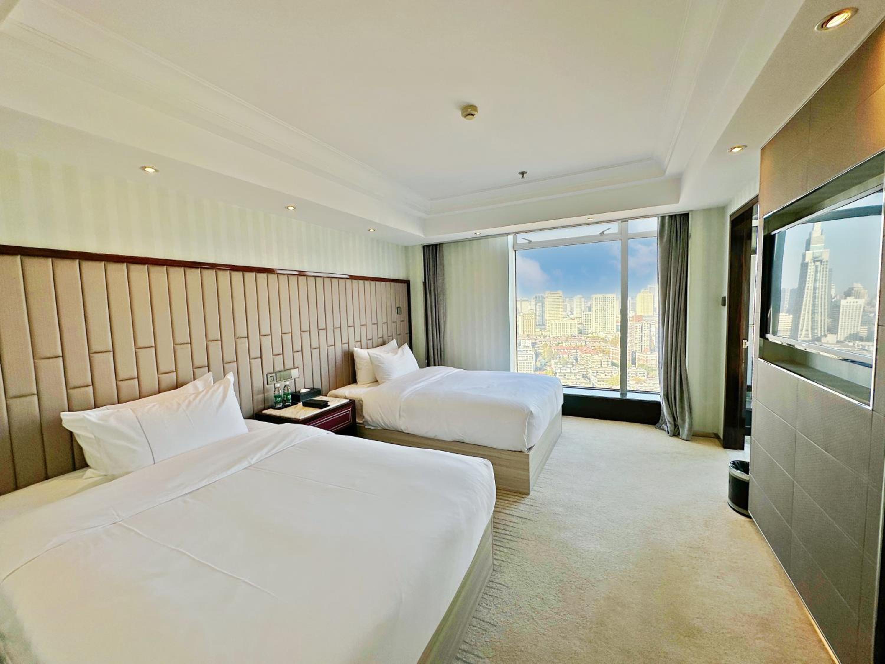 Lijia Twin Bed Suite - Photo 11