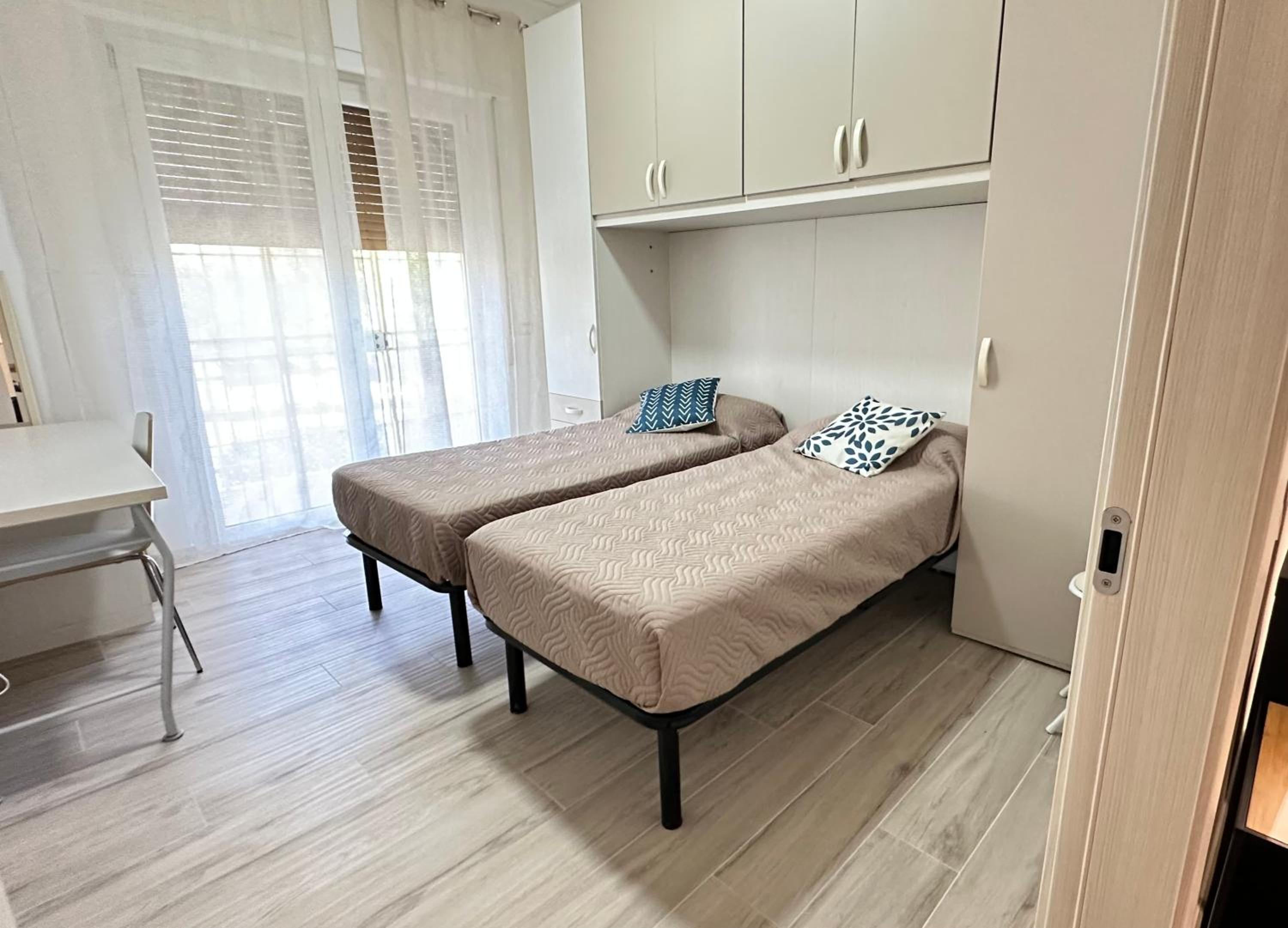 Three-Bedroom Apartment with Balcony photo 2