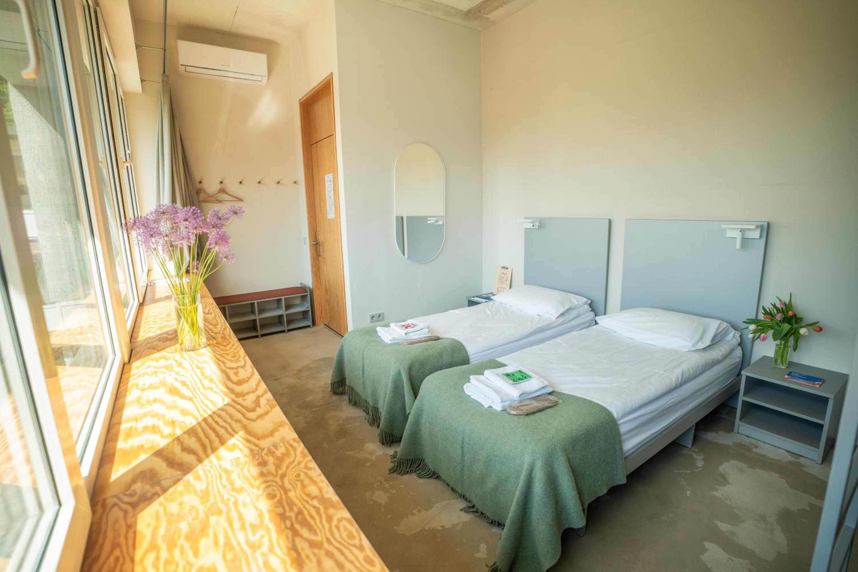 Quadruple Room with Air Condition and Shared Bathroom