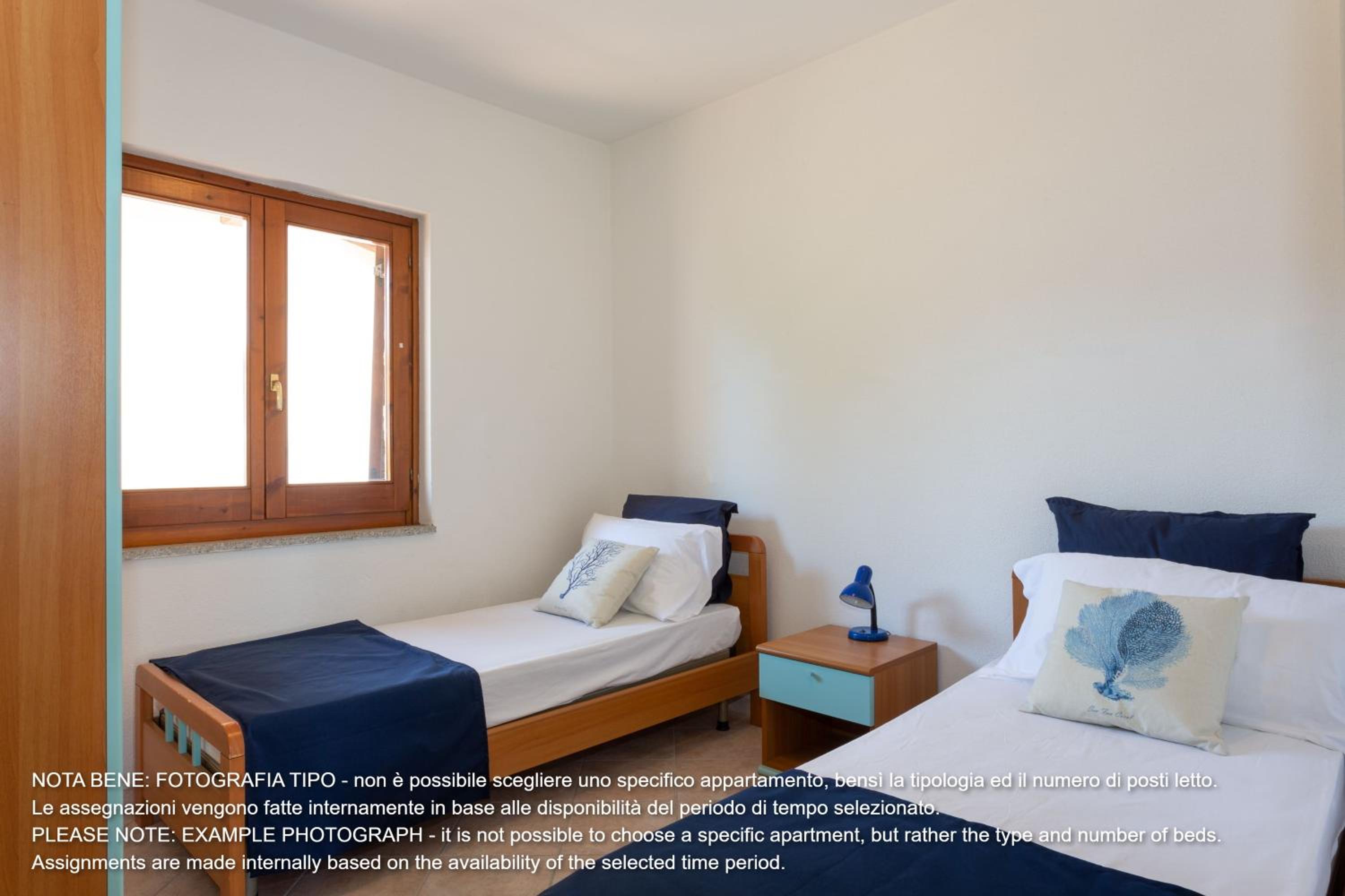 Two-Bedroom Apartment - Via Agammennone snc photo 3