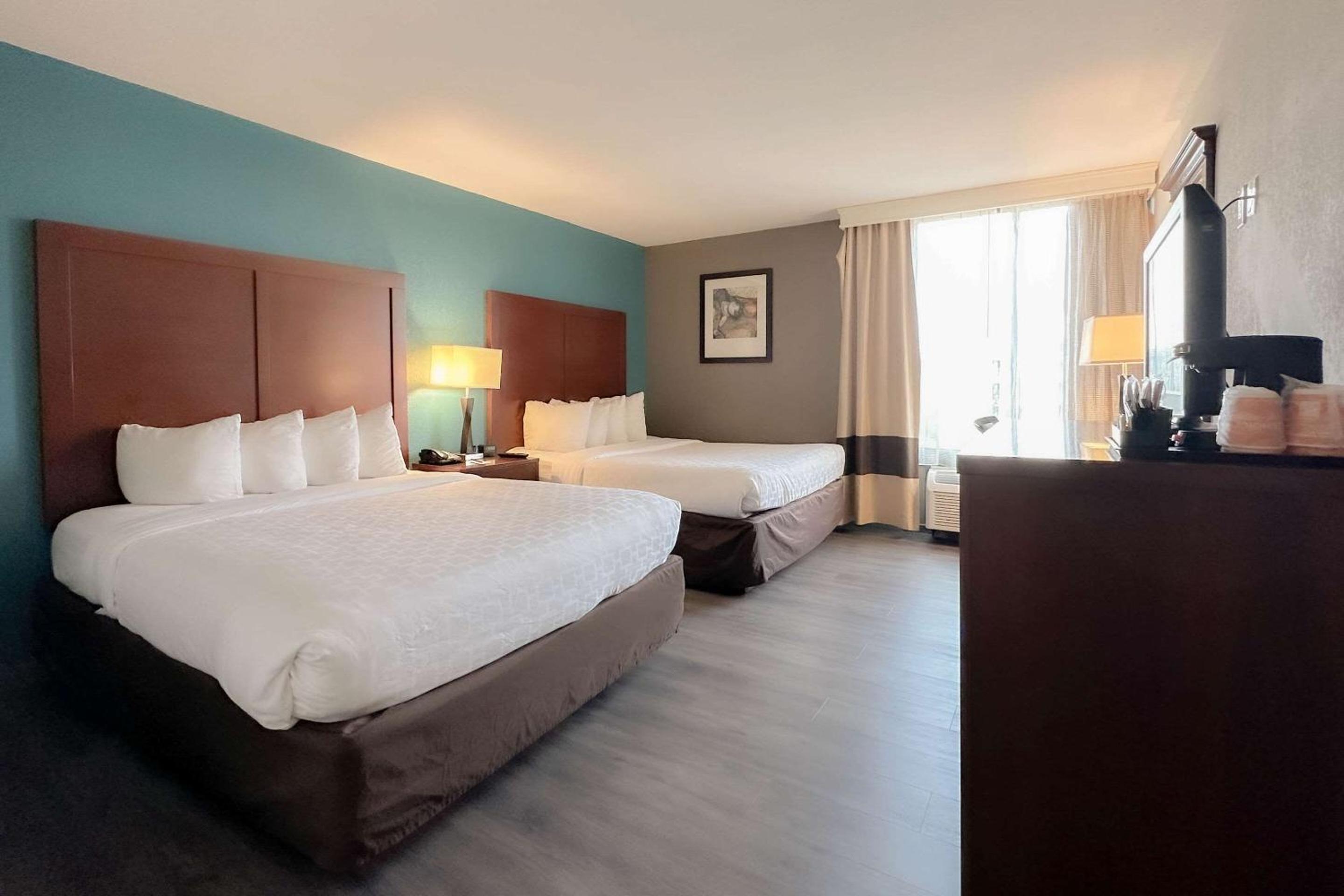 Deluxe Queen Room with Two Queen Beds with Sofa Bed
