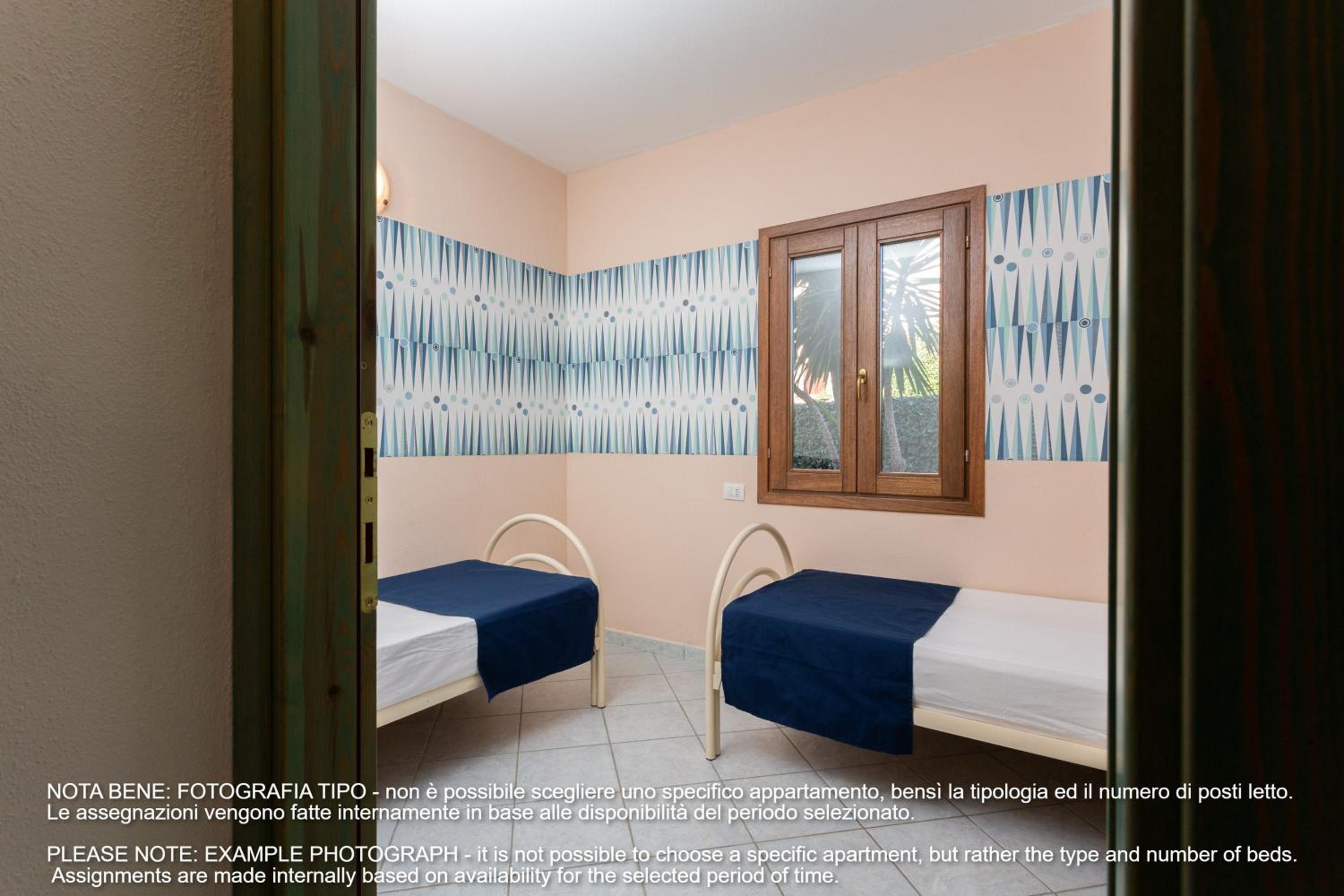 Two-Bedroom Apartment - Via Agammennone snc photo 2