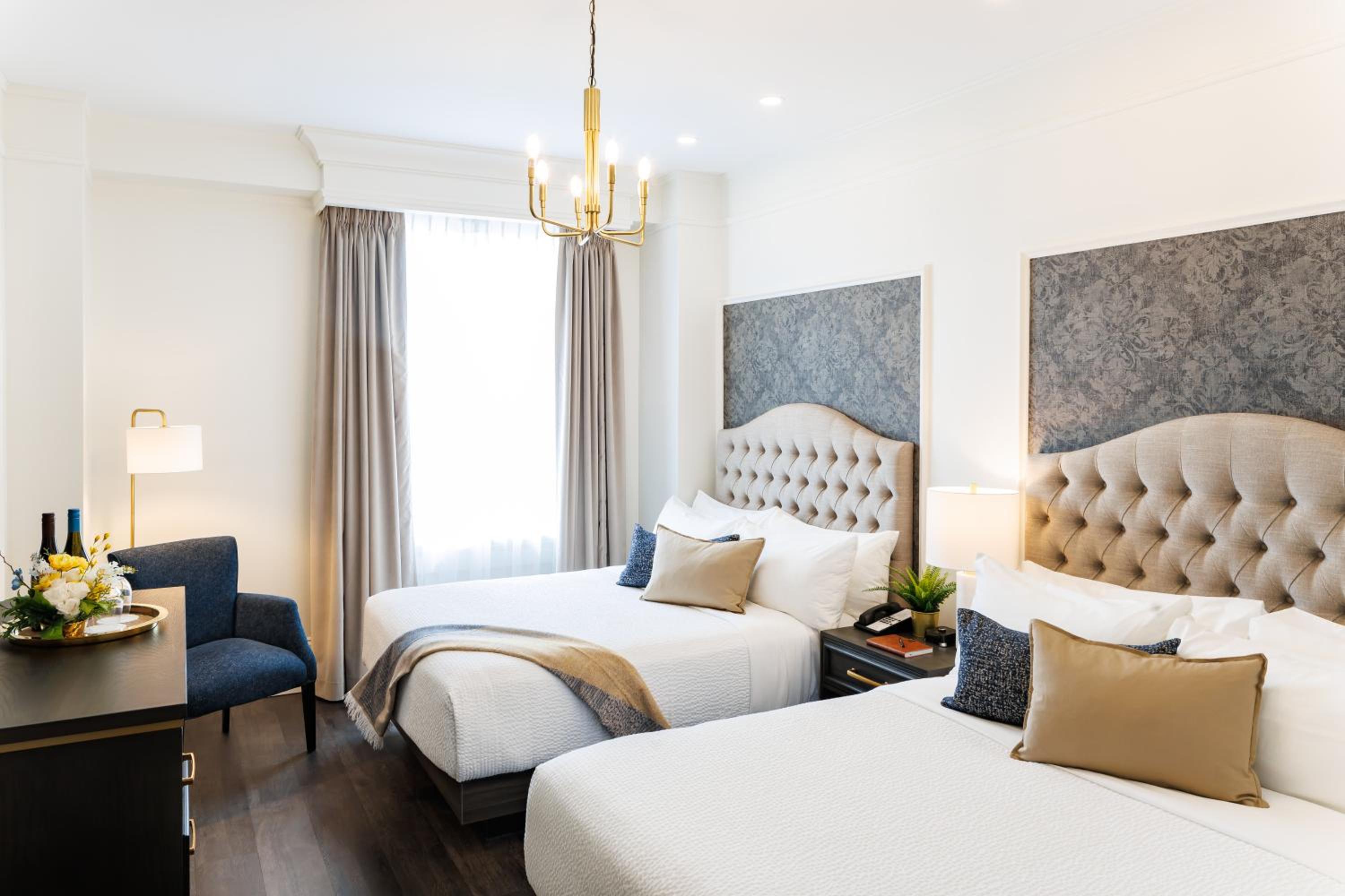 Deluxe Queen Room with Two Queen Beds - Photo 1