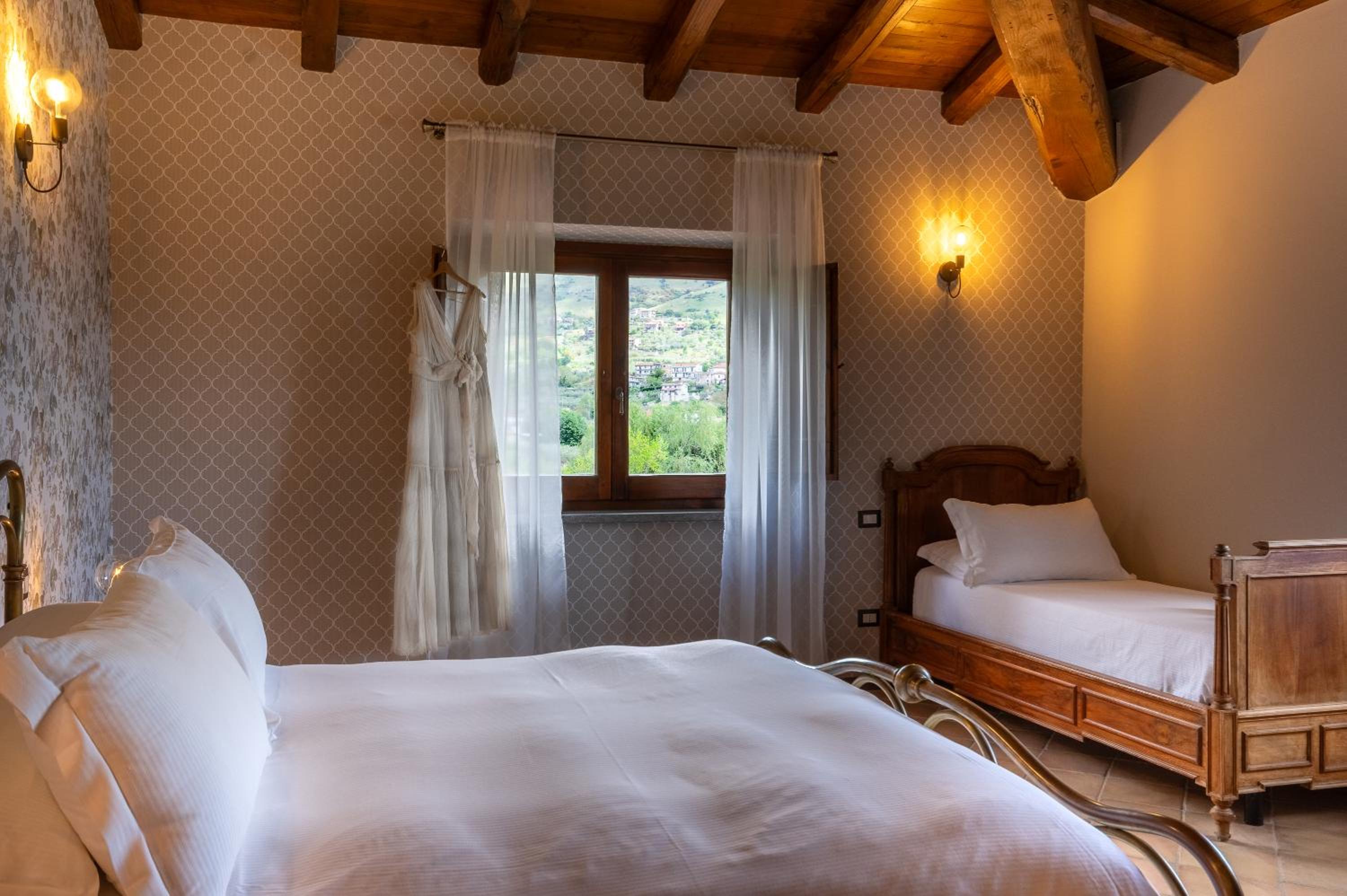 Deluxe Triple Room - Photo 12