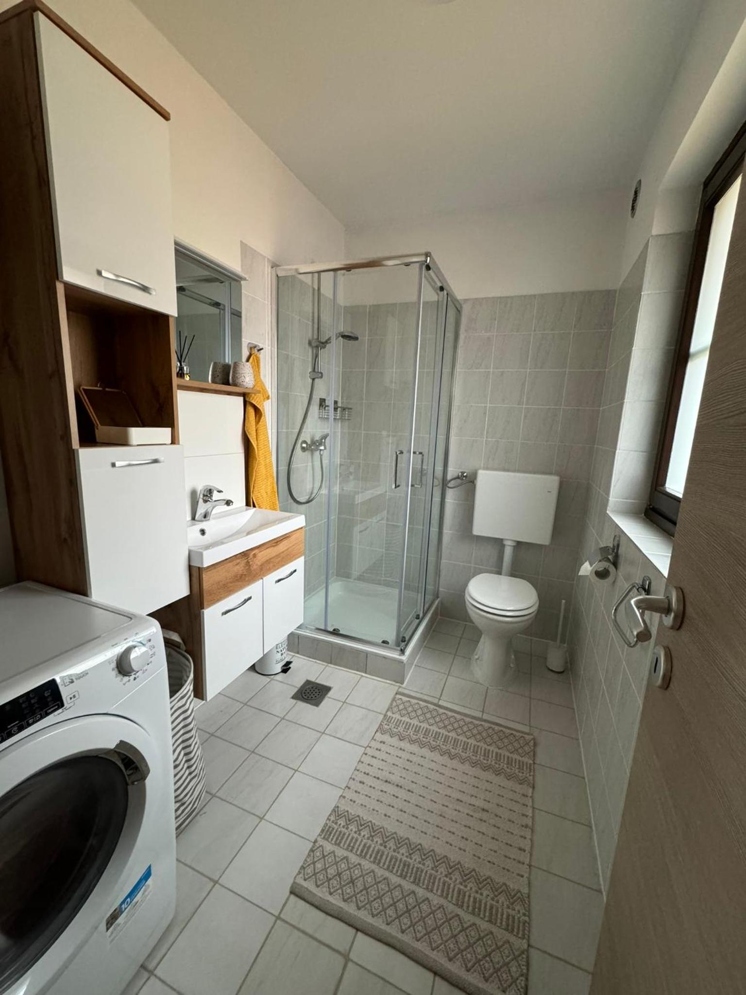 Three-Bedroom House - Photo 23