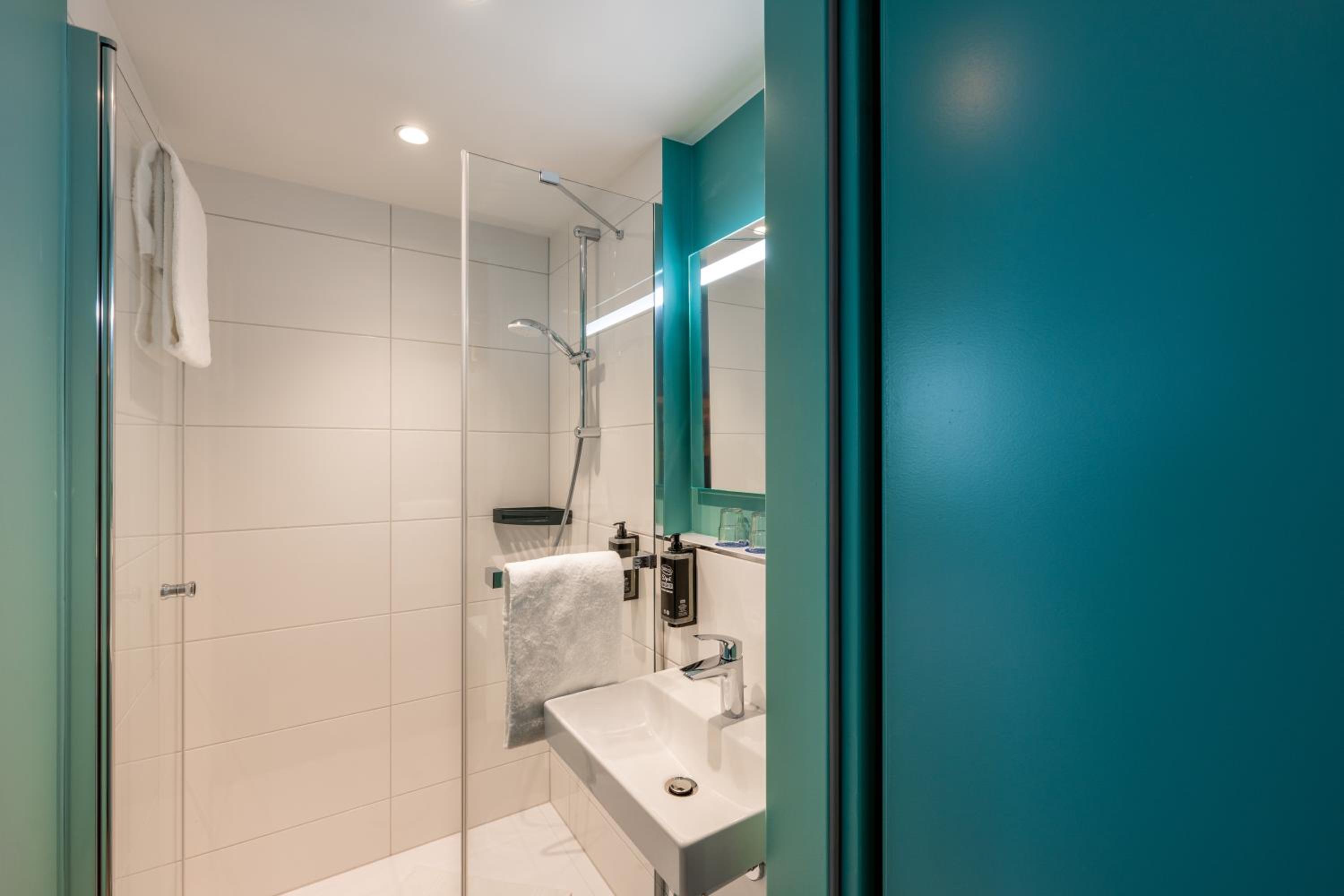 Standard Room with double bed and sofa