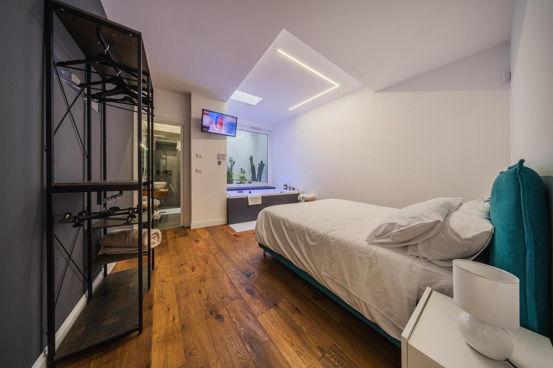 Quarto Queen com Banheira de Hidromassagem