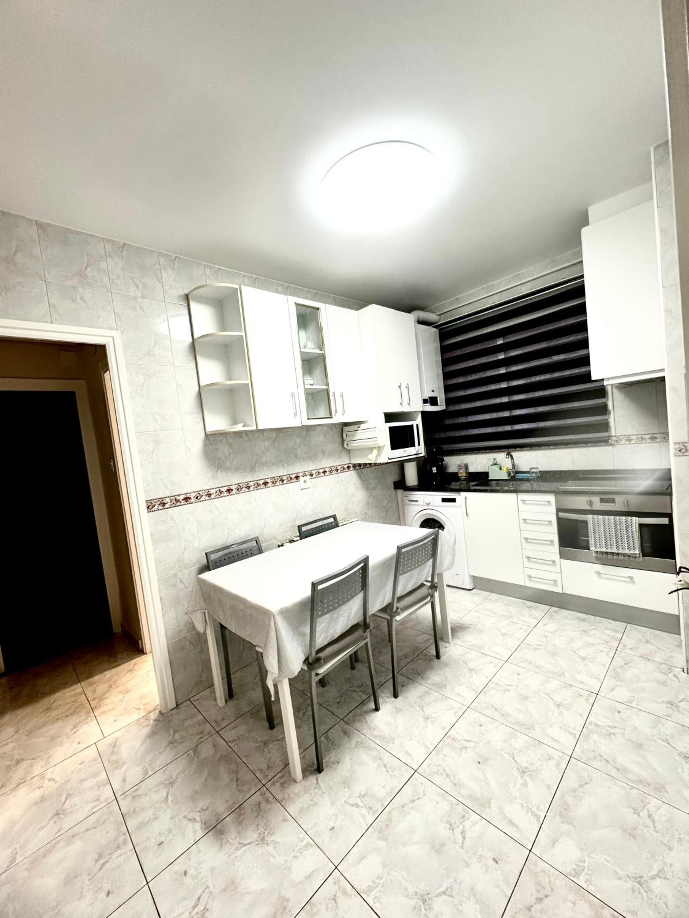 Three-Bedroom Apartment photo 2