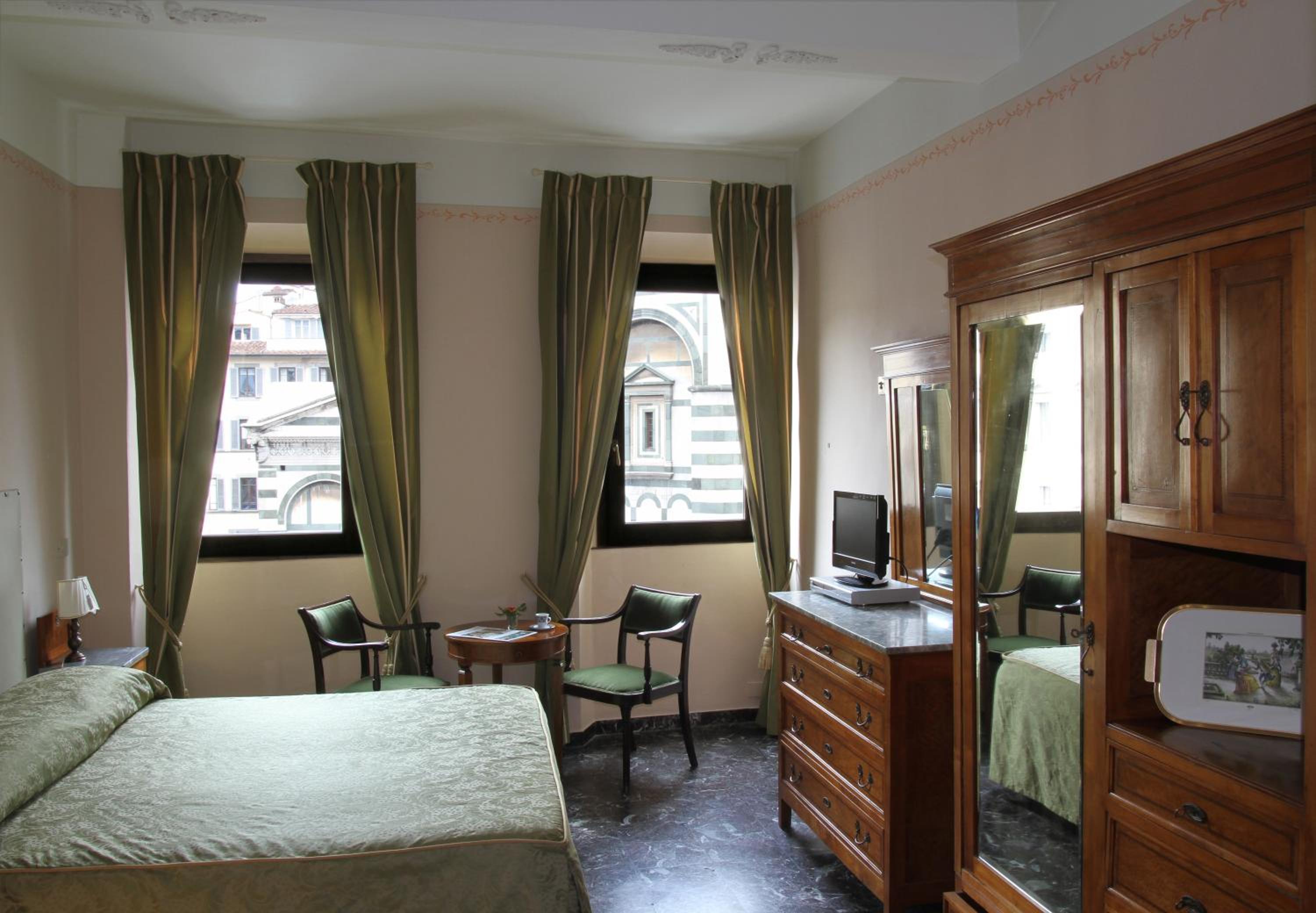 Double or Twin Room with Duomo view photo 1