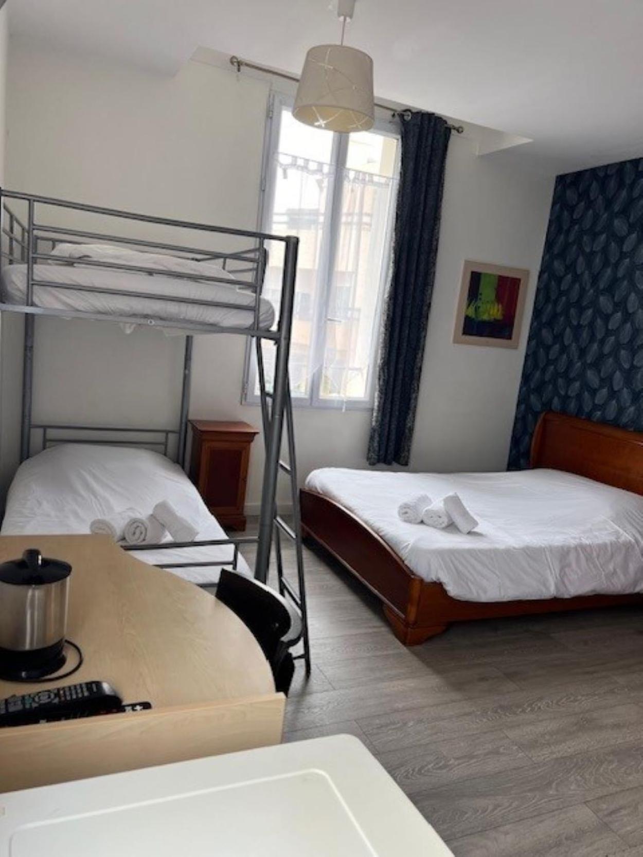Quadruple Room - Photo 1