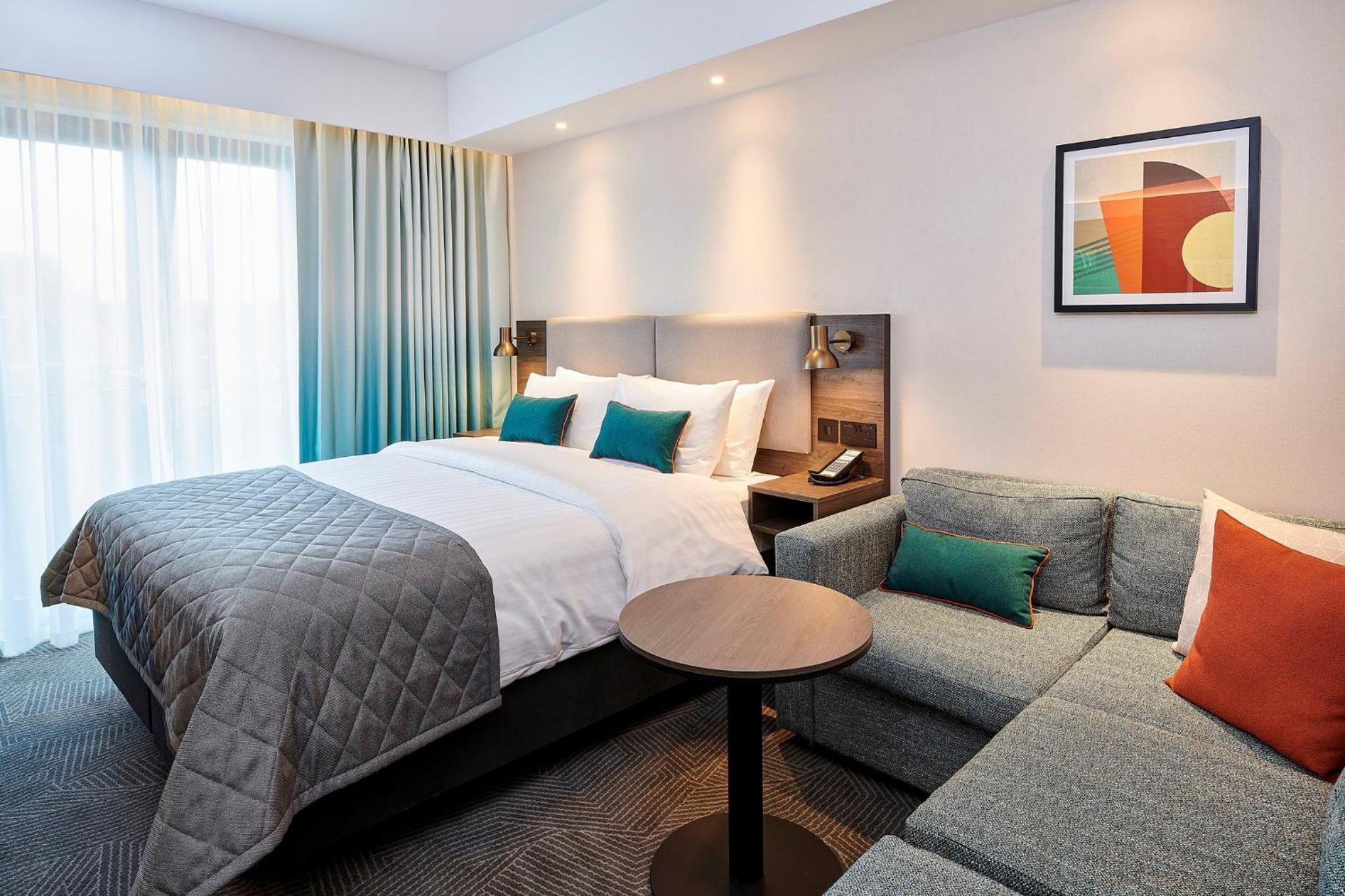 Premium King Room with Double Sofa Bed - Photo 3