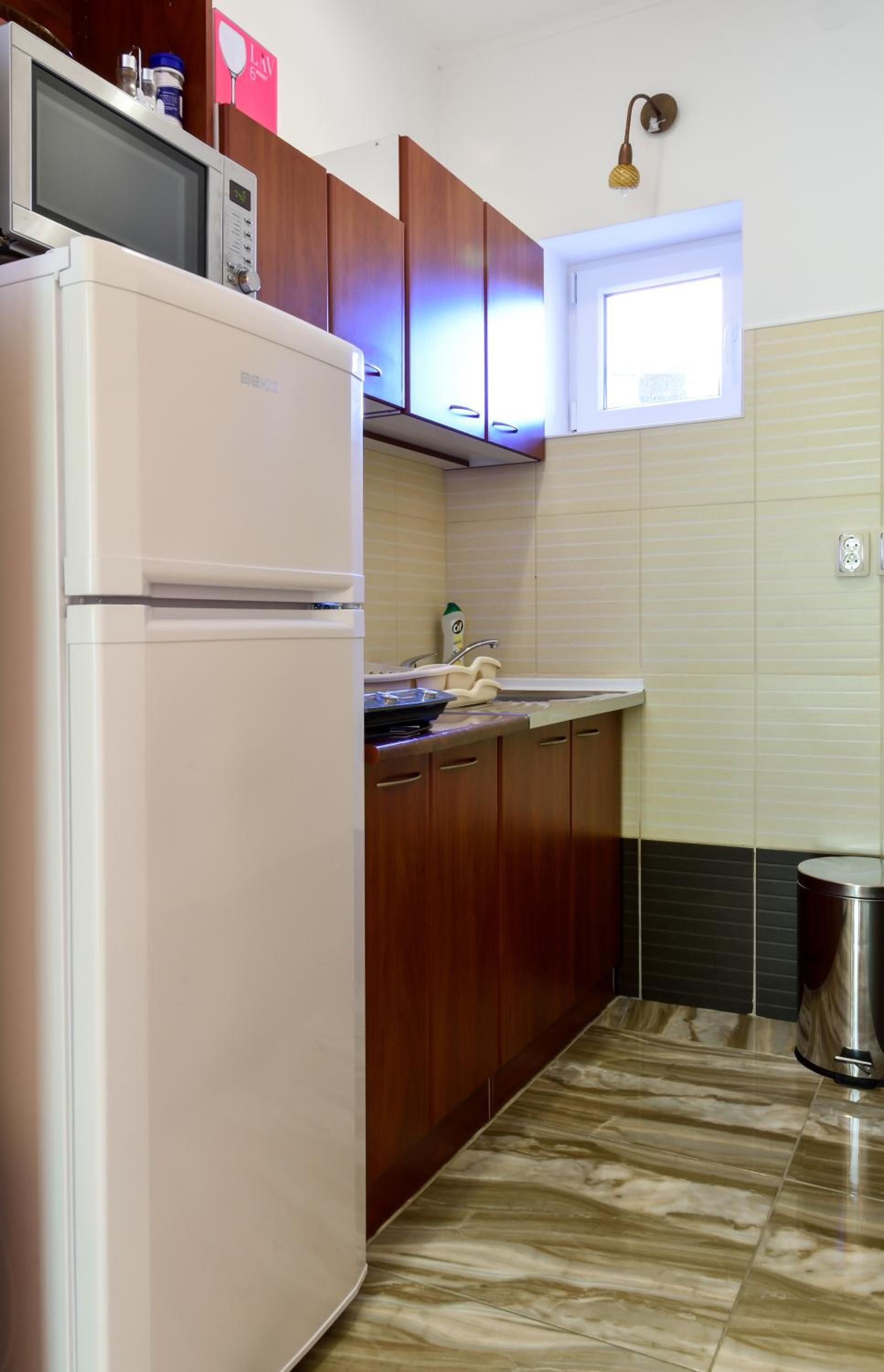 Two-Bedroom Ground Floor Apartment with Garden View - Photo 13