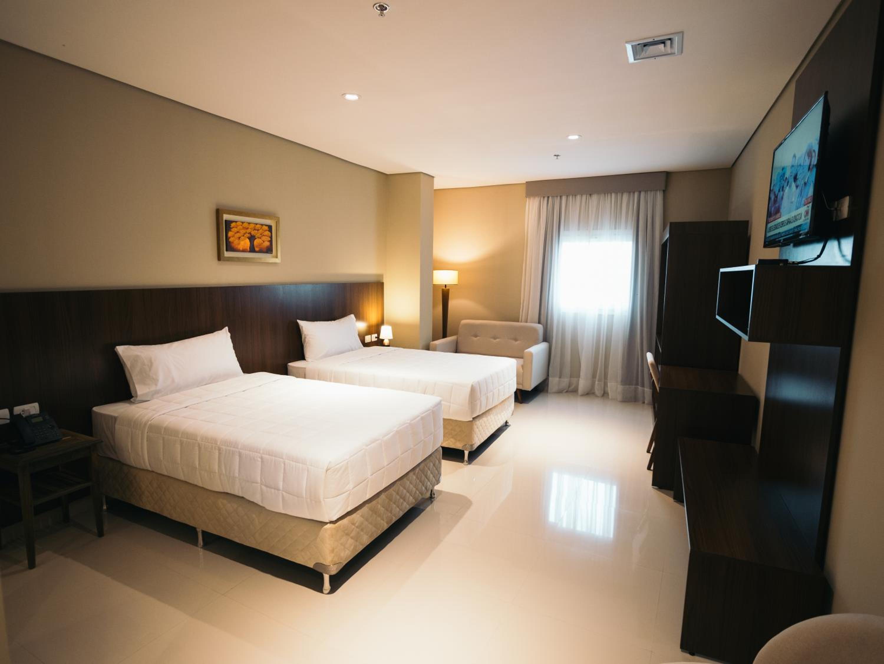 Deluxe Queen Room with Two Queen Beds photo 1