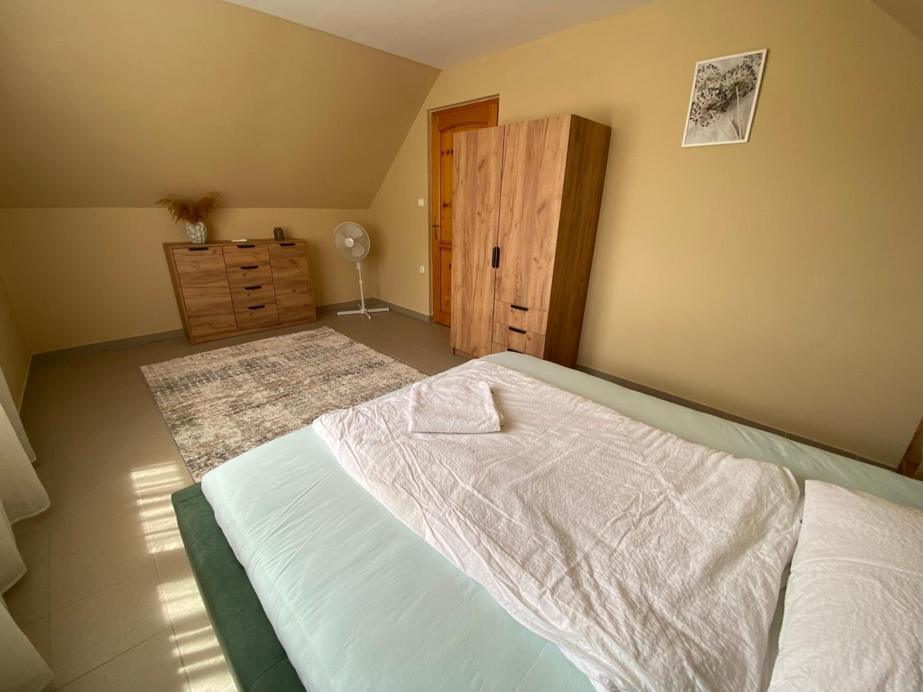 Three-Bedroom Apartment - Photo 16