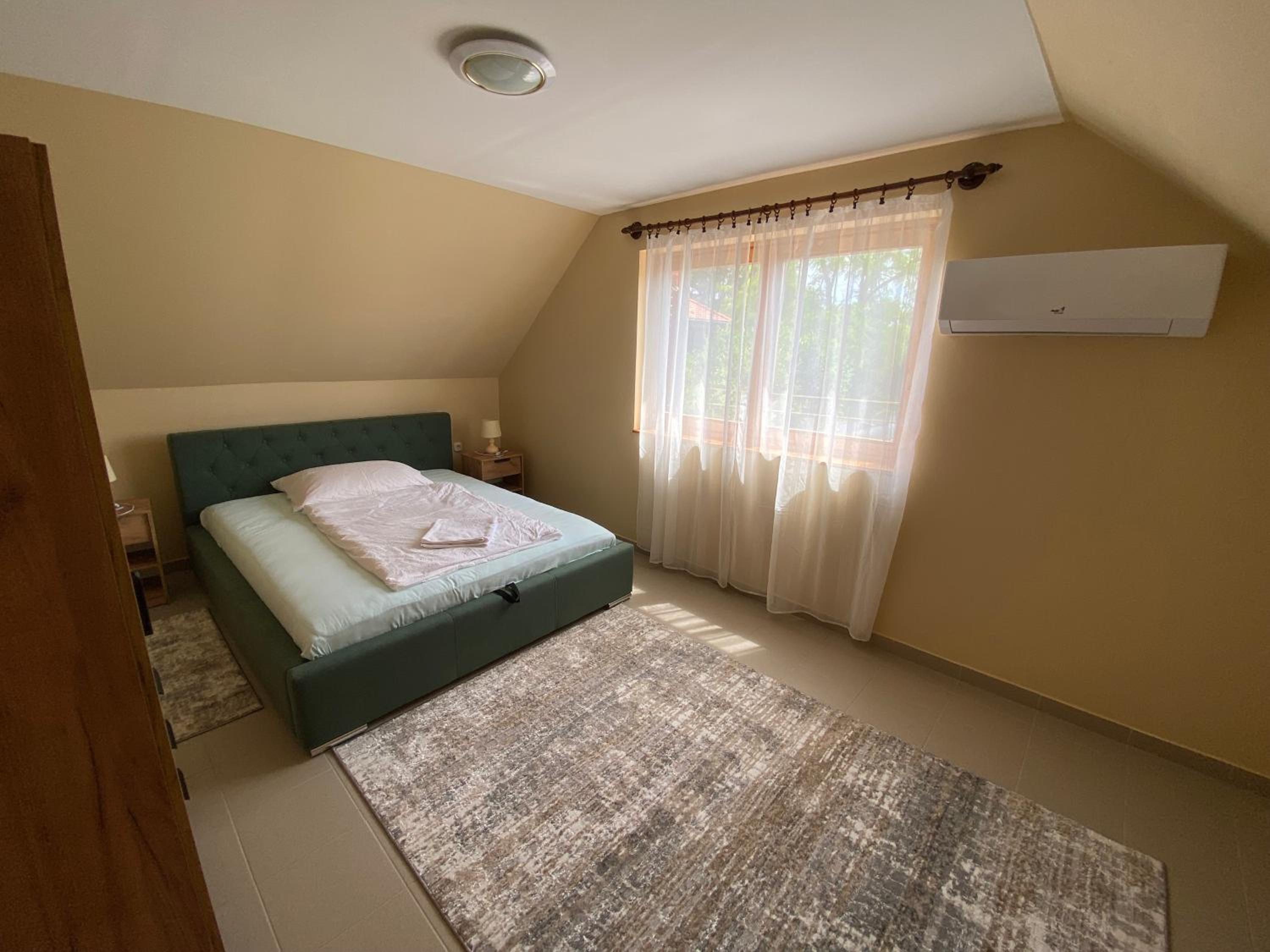 Three-Bedroom Apartment - Photo 18