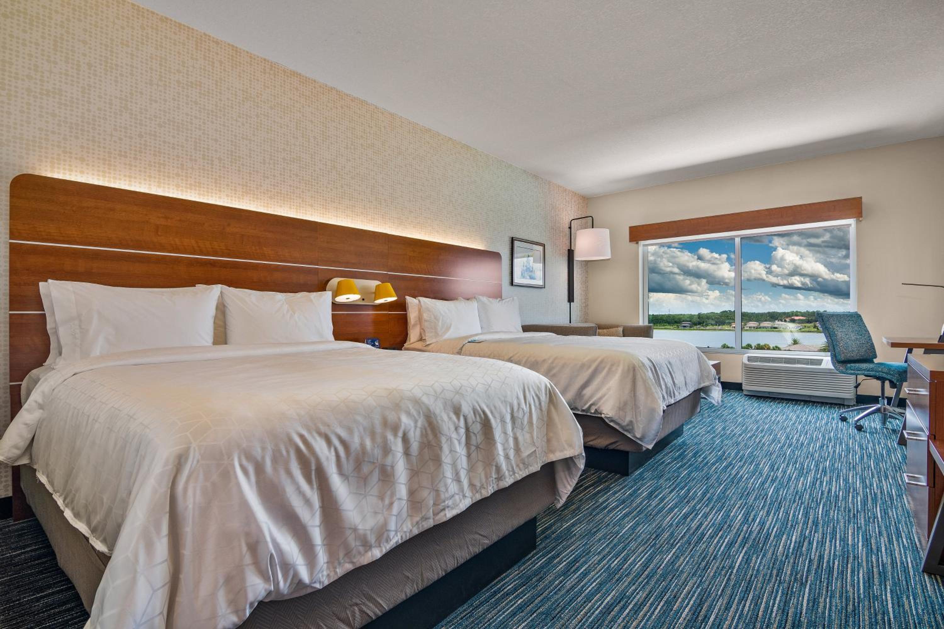 Queen Suite with Two Queen Beds and Sofa Bed