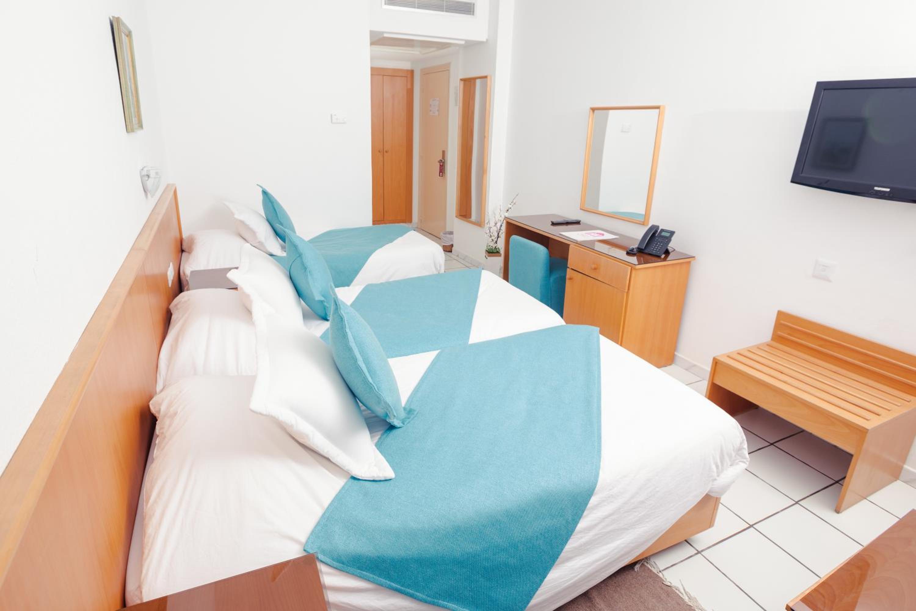 Triple Room - Photo 1