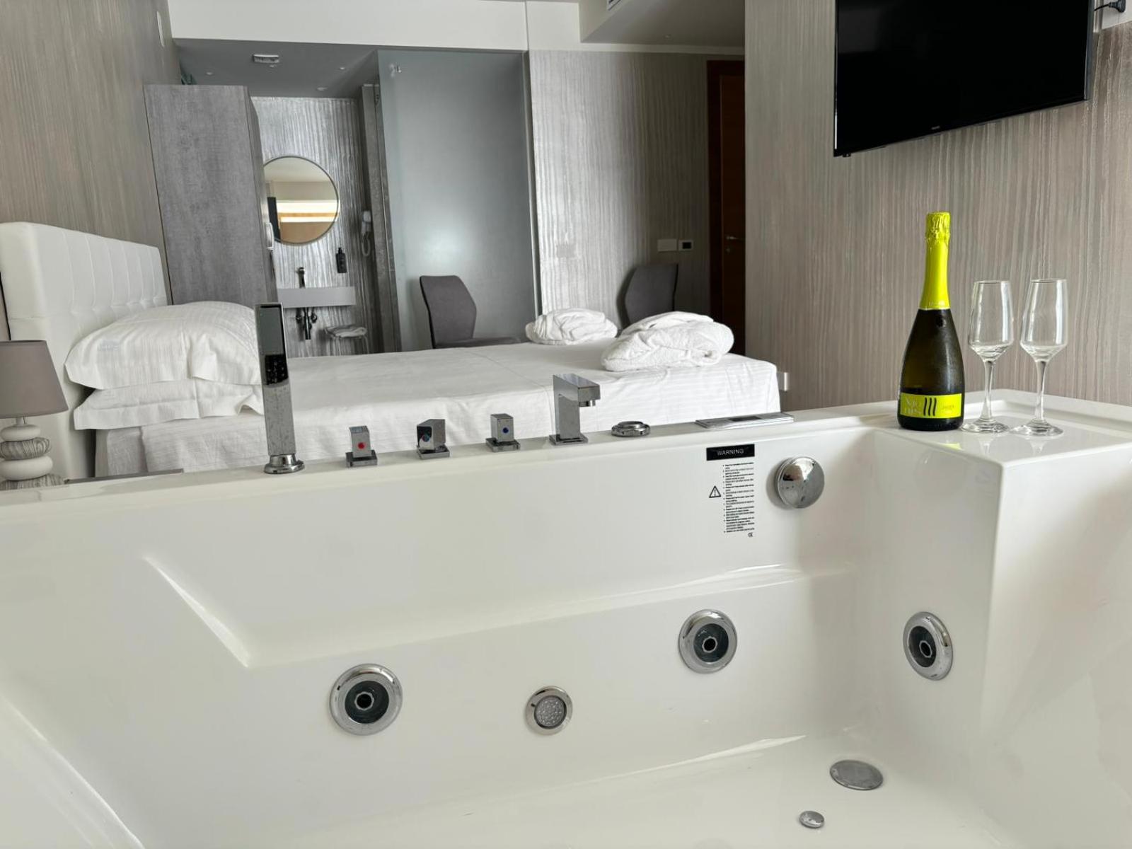 Suite with Hot Tub - Photo 13