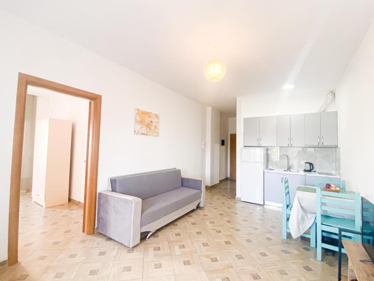 One-Bedroom Apartment with Balcony and City View