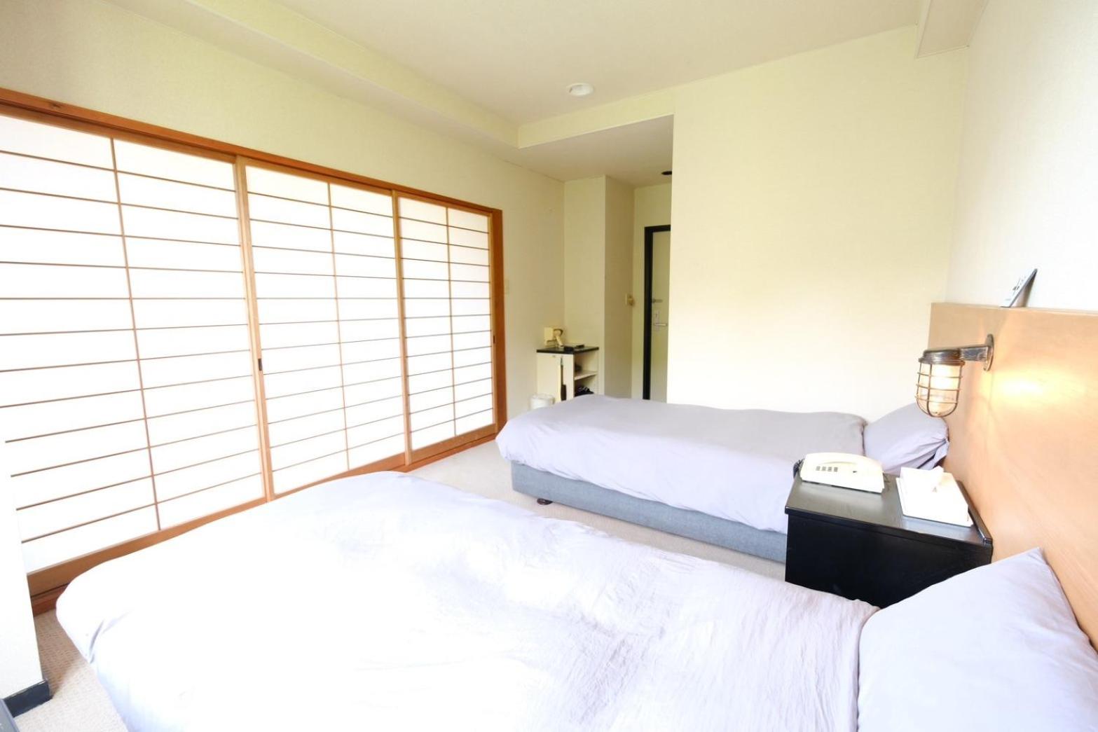 Quadruple Room with Private Bathroom photo 2
