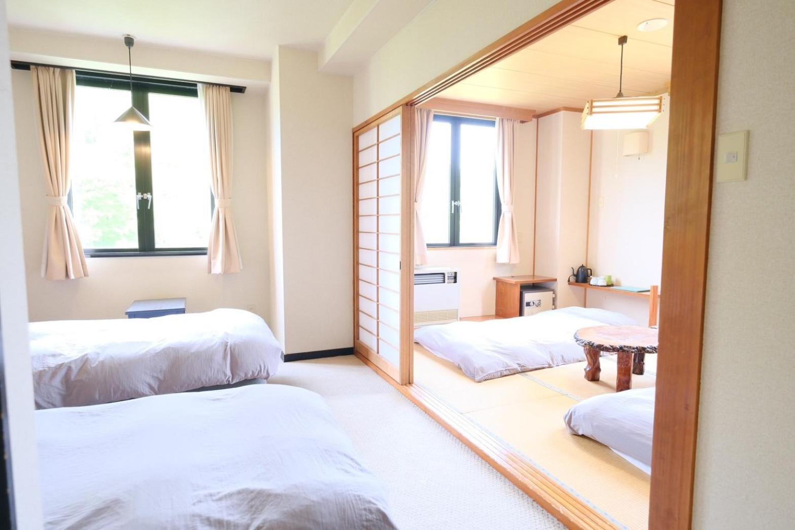 Quadruple Room with Private Bathroom photo 3