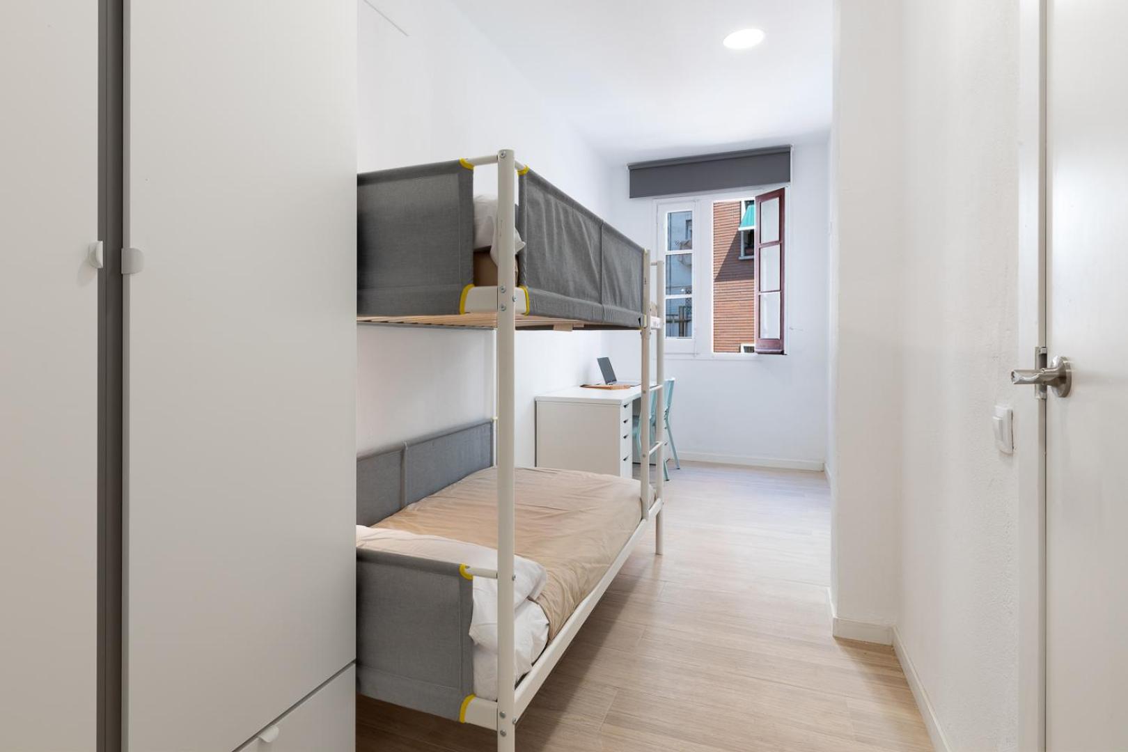 Bed In Female Dormitory Room With Bunk Bed photo 3