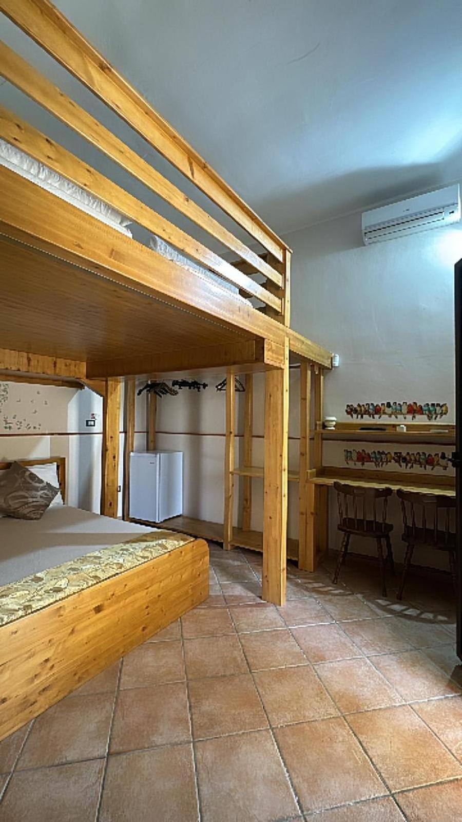 Quadruple Room with Private Bathroom photo 1