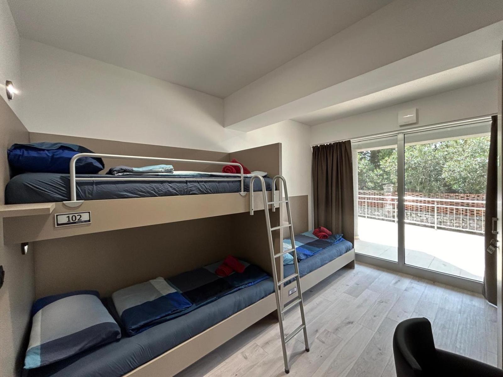 Bed in Male Dormitory Room