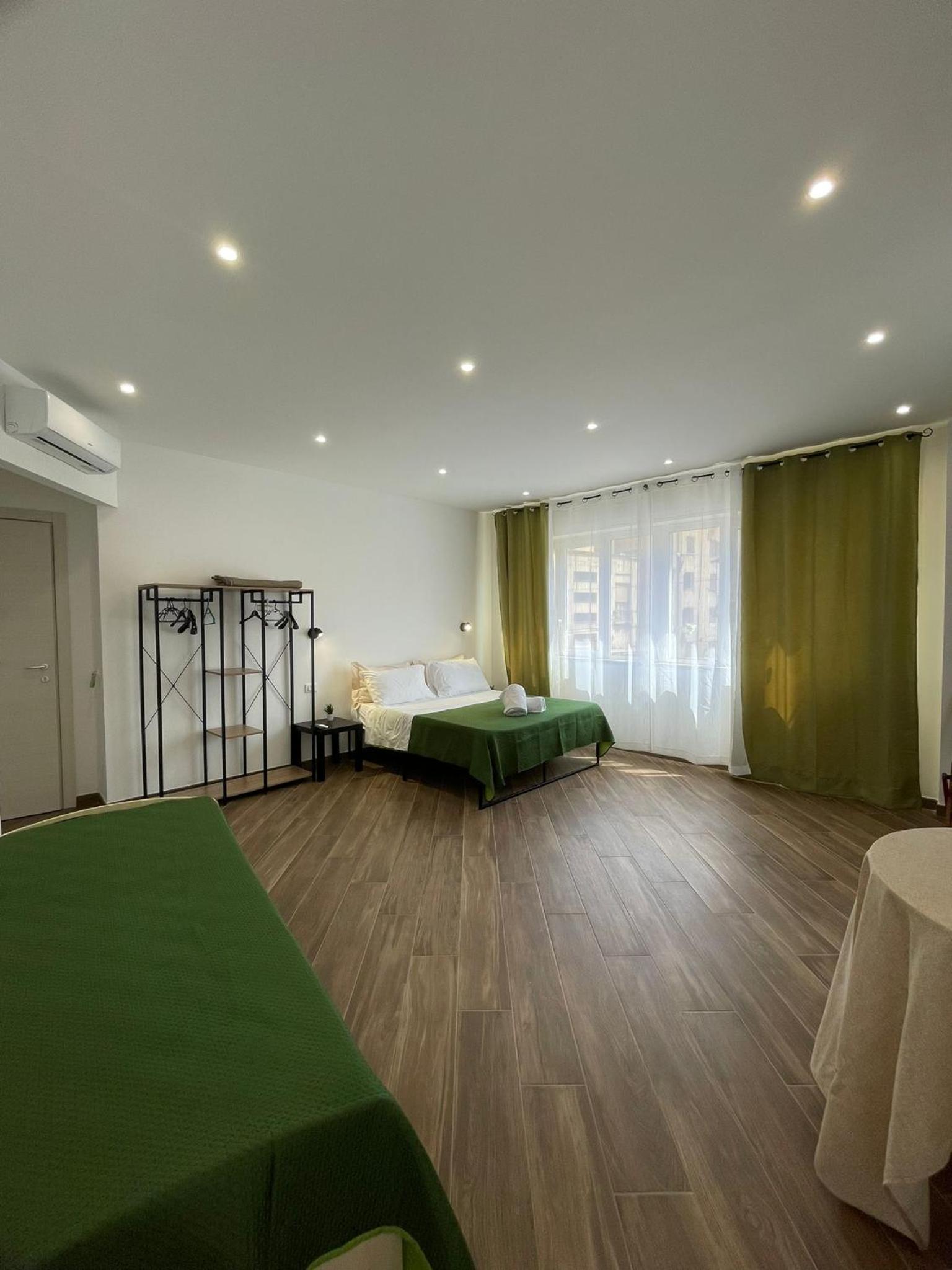Quadruple Room with Private Bathroom