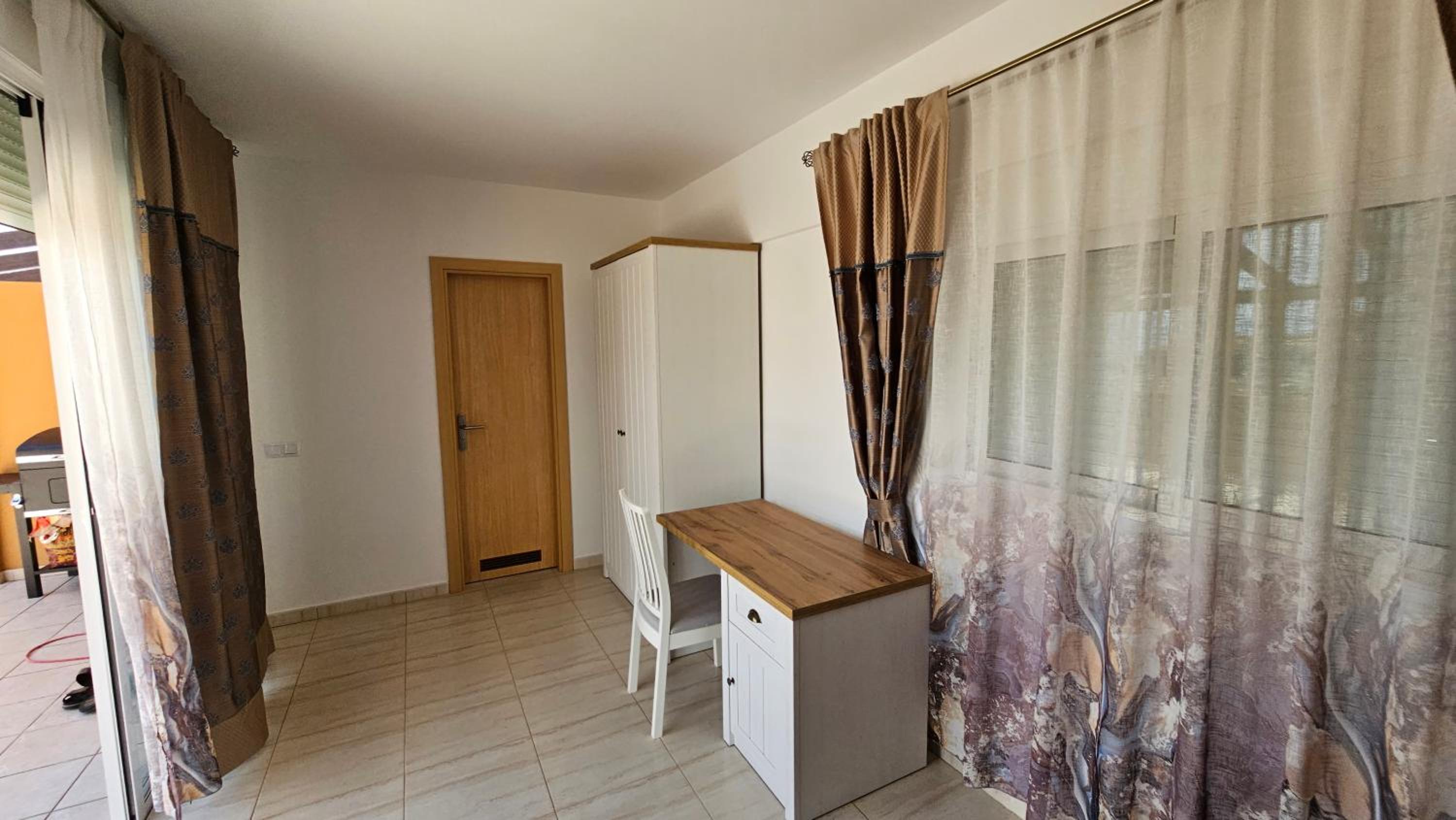 Three-Bedroom House photo 3