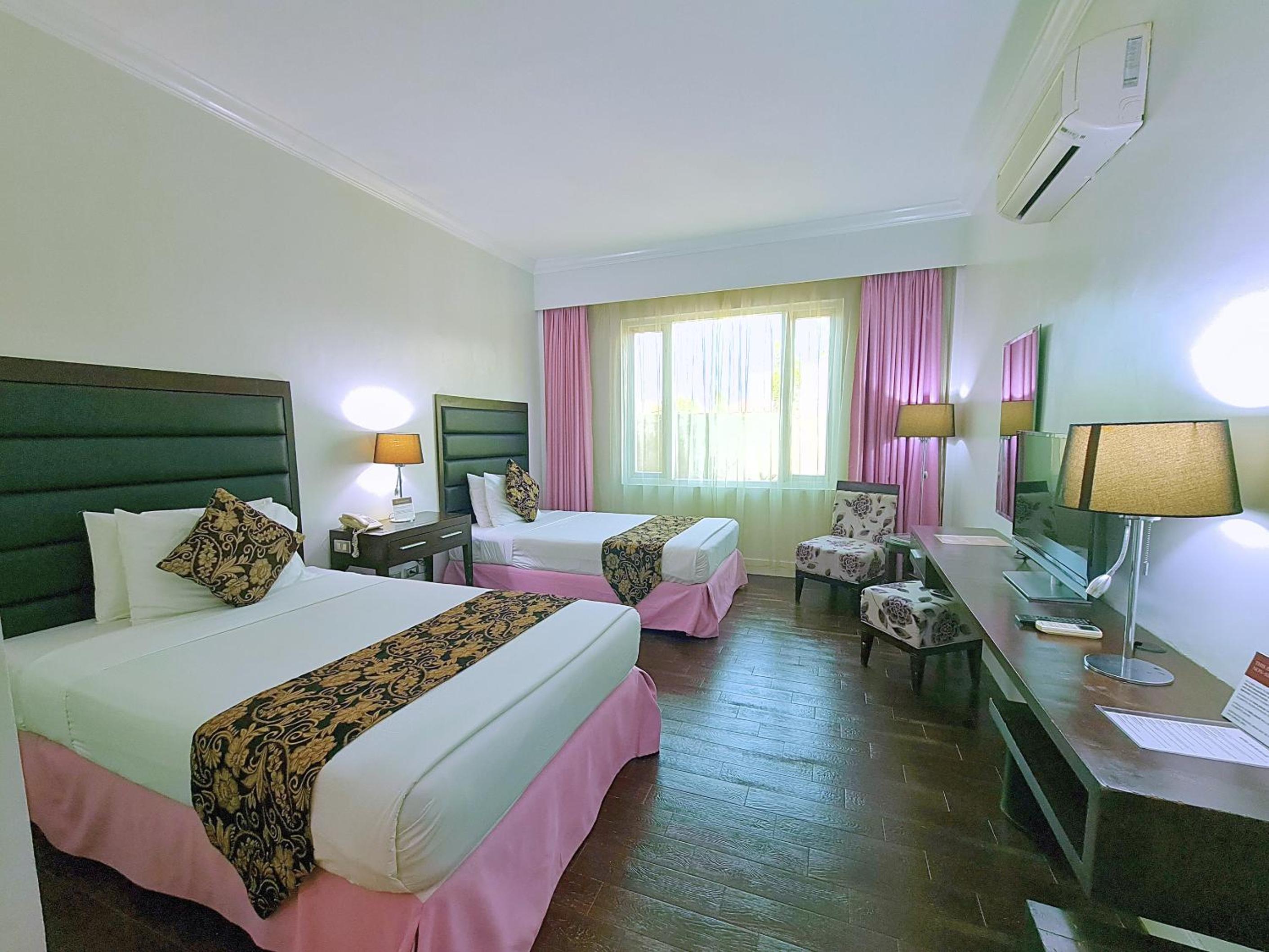 Deluxe Room - Photo 4
