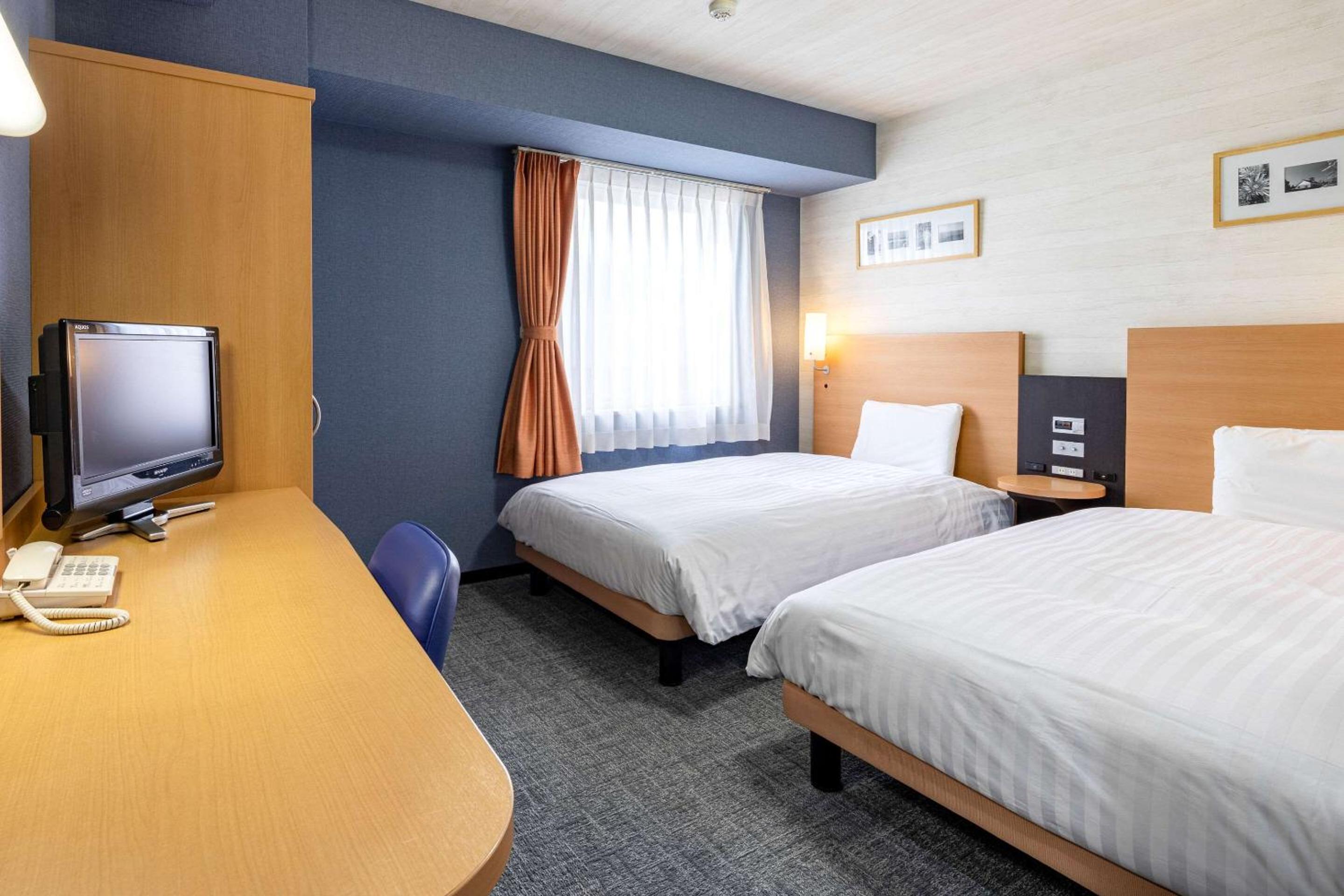 Twin Room - Non-Smoking - Photo 1